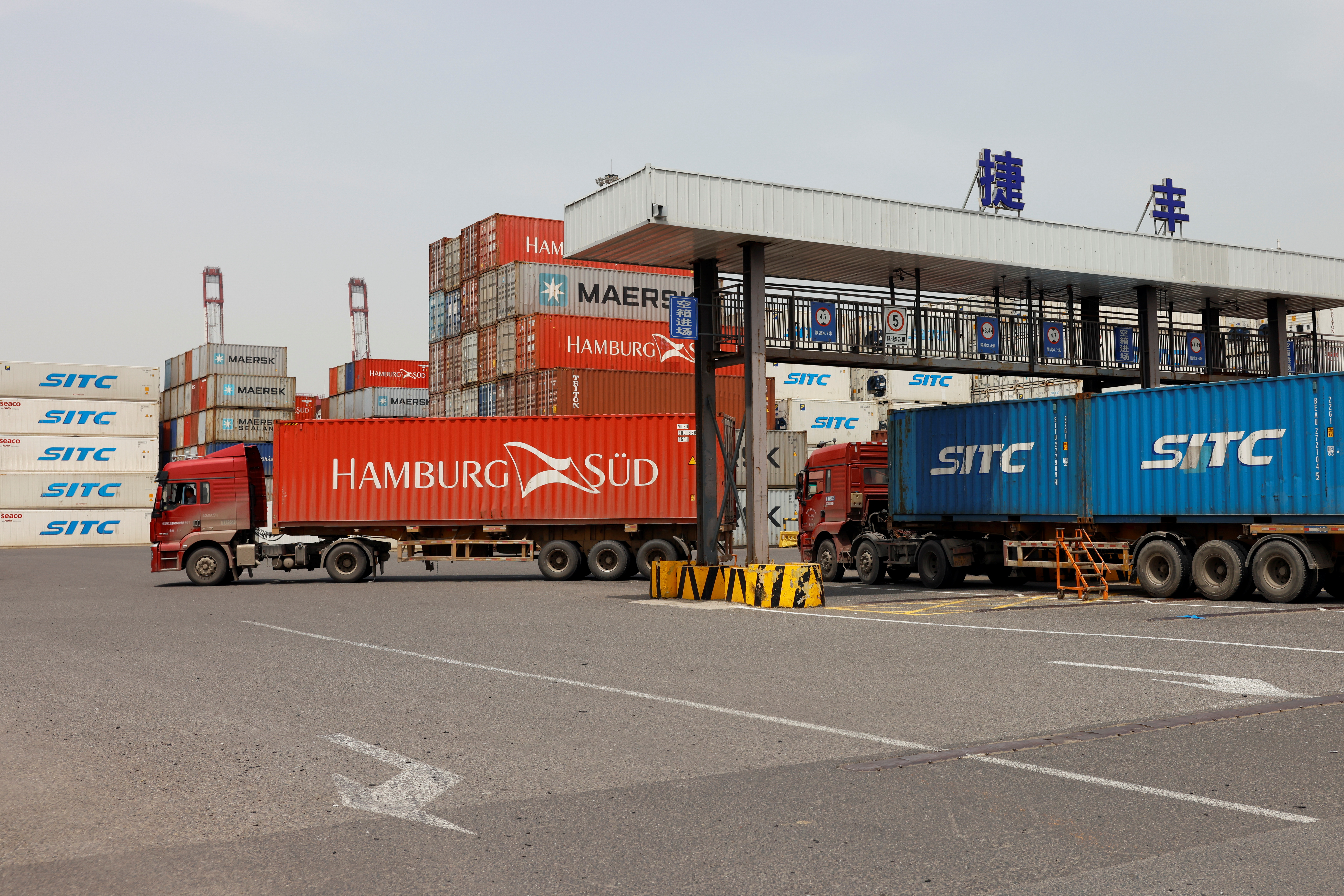 Trucks transport containers at Qingdao port