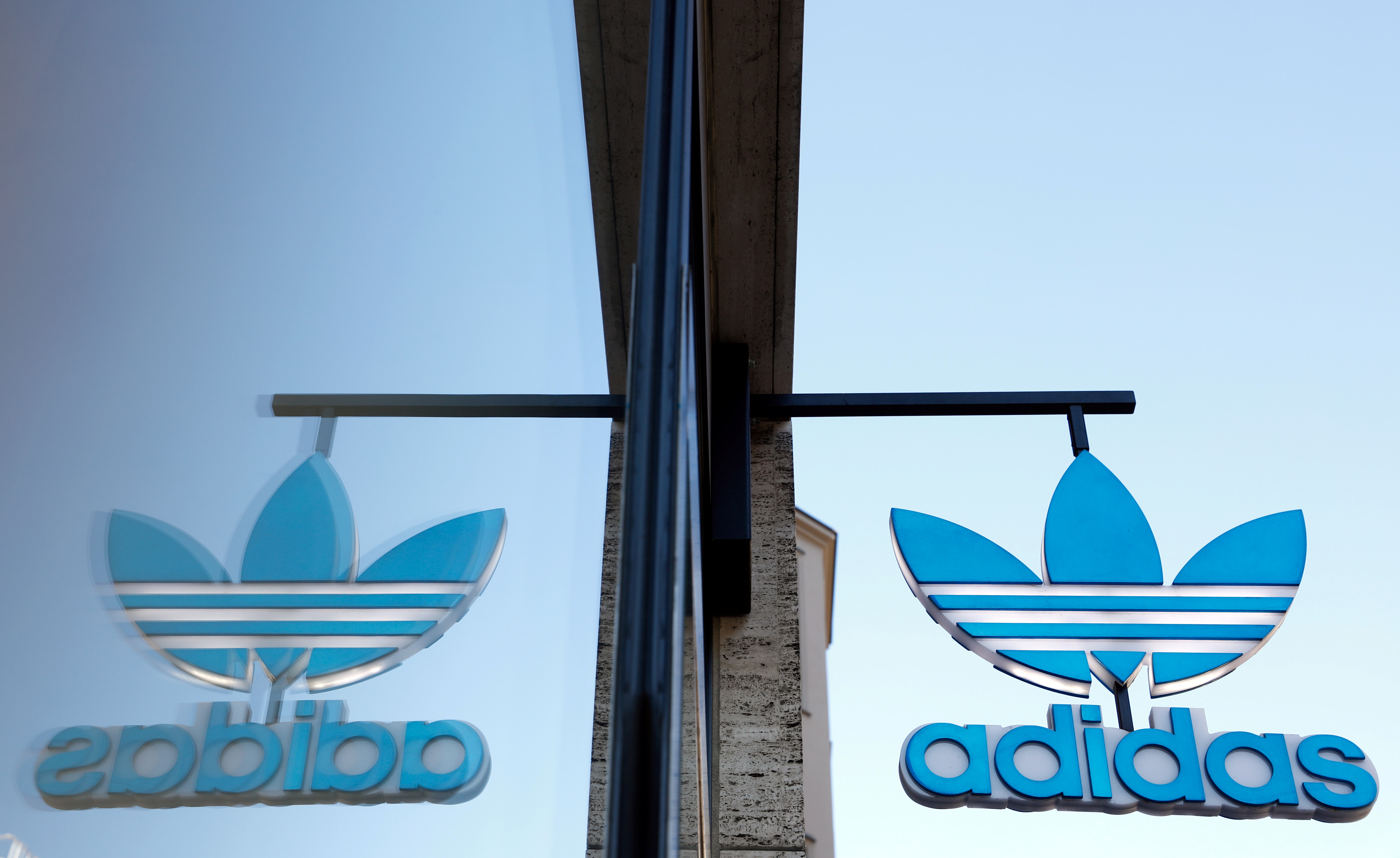 Adidas pushes online sales and sustainability five-year | Reuters