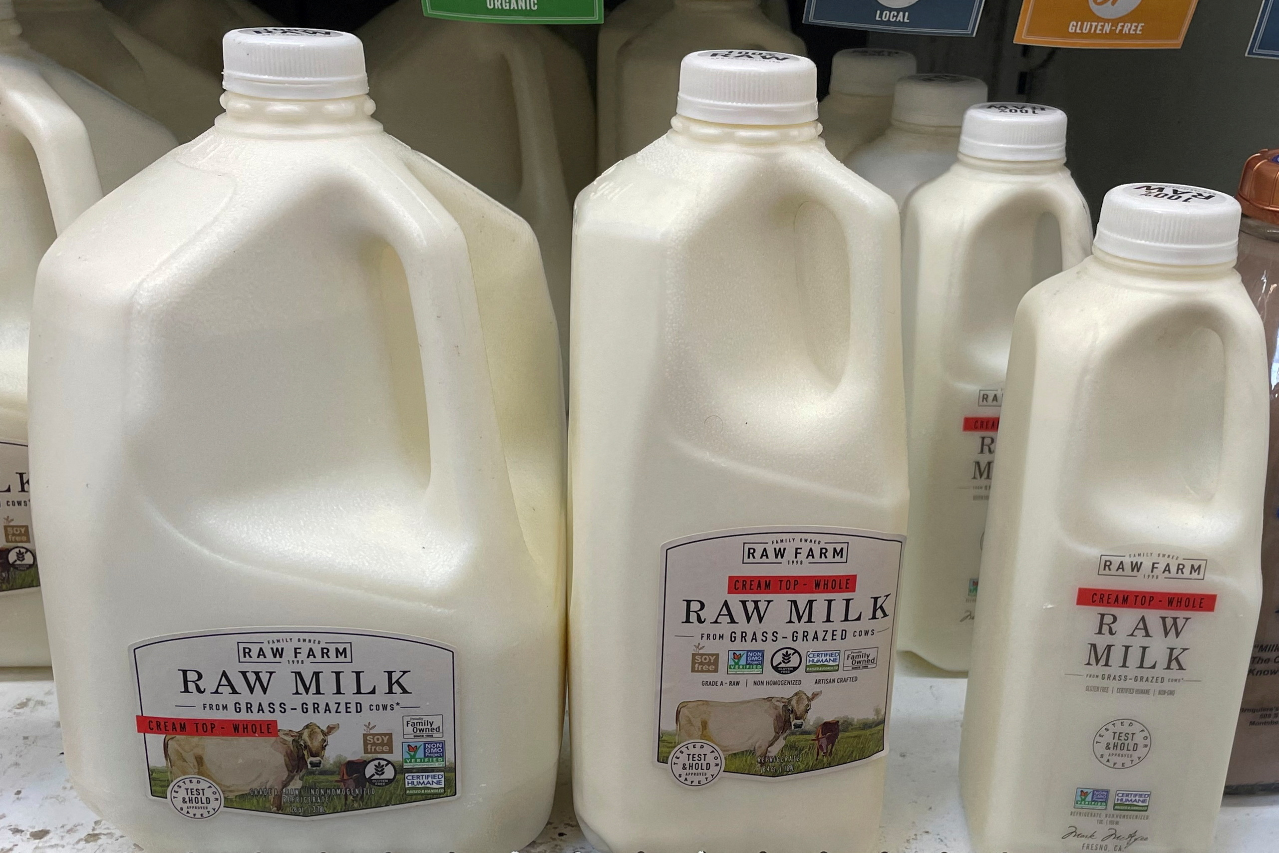 Bottles of raw milk are seen in a display in a Sprouts Farmers Market store in Los Angeles