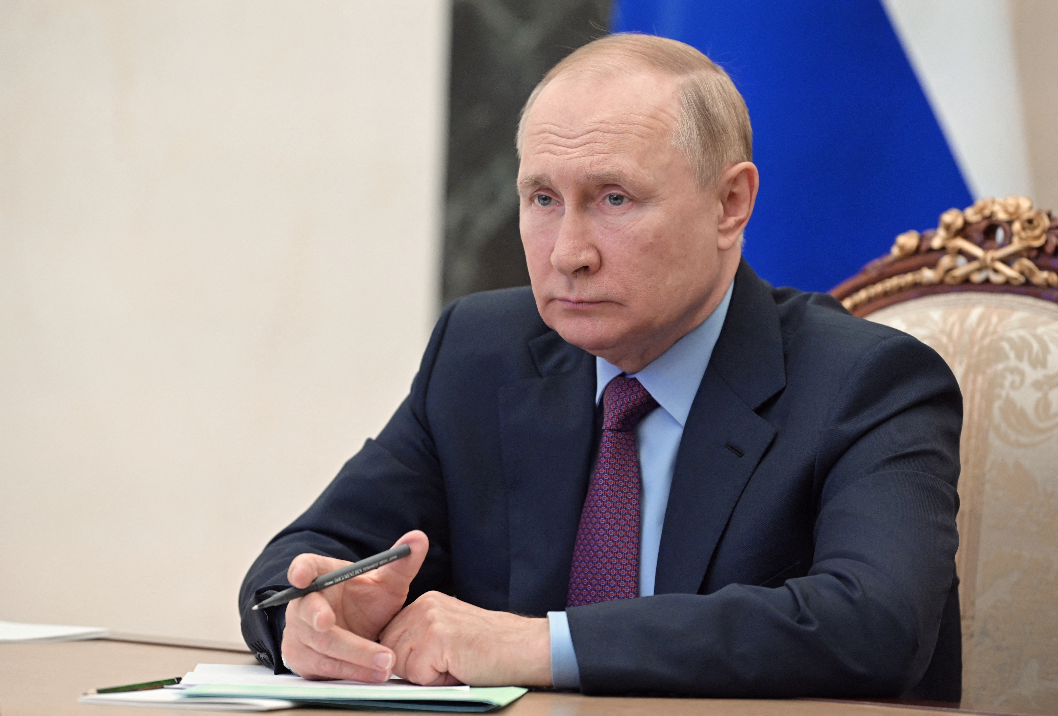 Russian President Vladimir Putin chairs a meeting on the development of the country's metallurgical sector, via a video link in Moscow