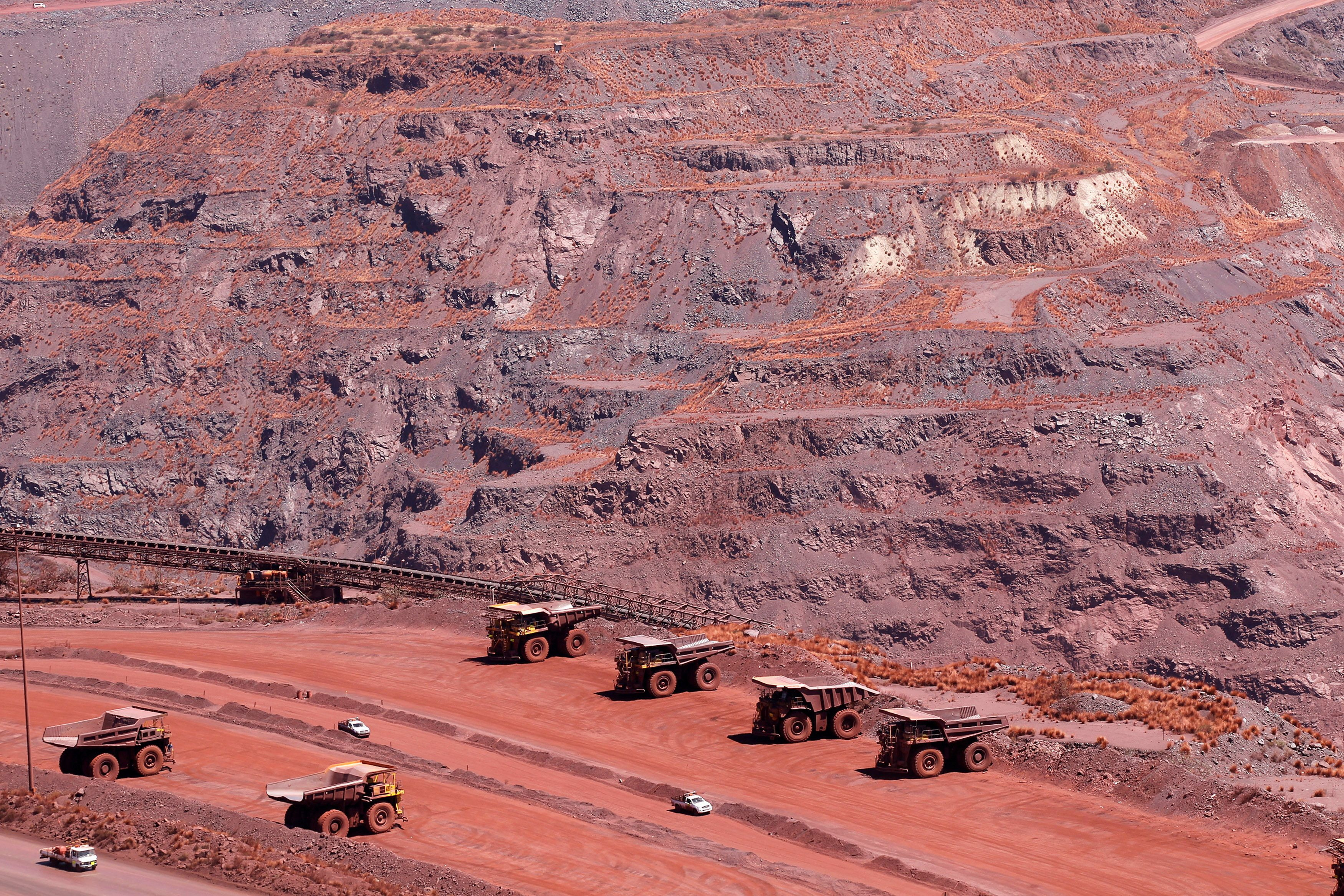 Haul trucks are seen at Kumba Iron Ore, the world's largest iron ore mines in Khathu, Northern Cape province, South Africa