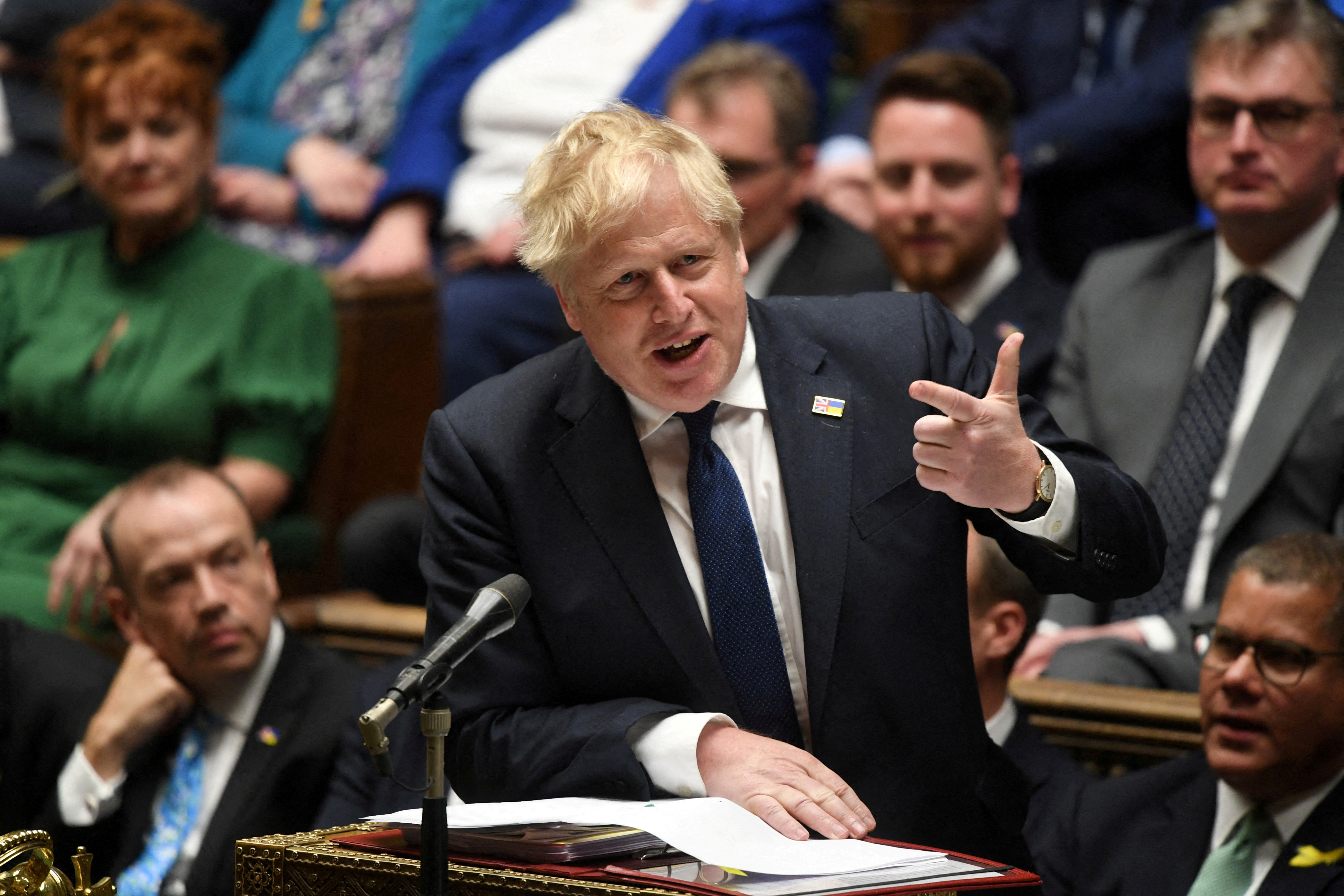 British Prime Minister Boris Johnson answers questions during a House of Commons session in London