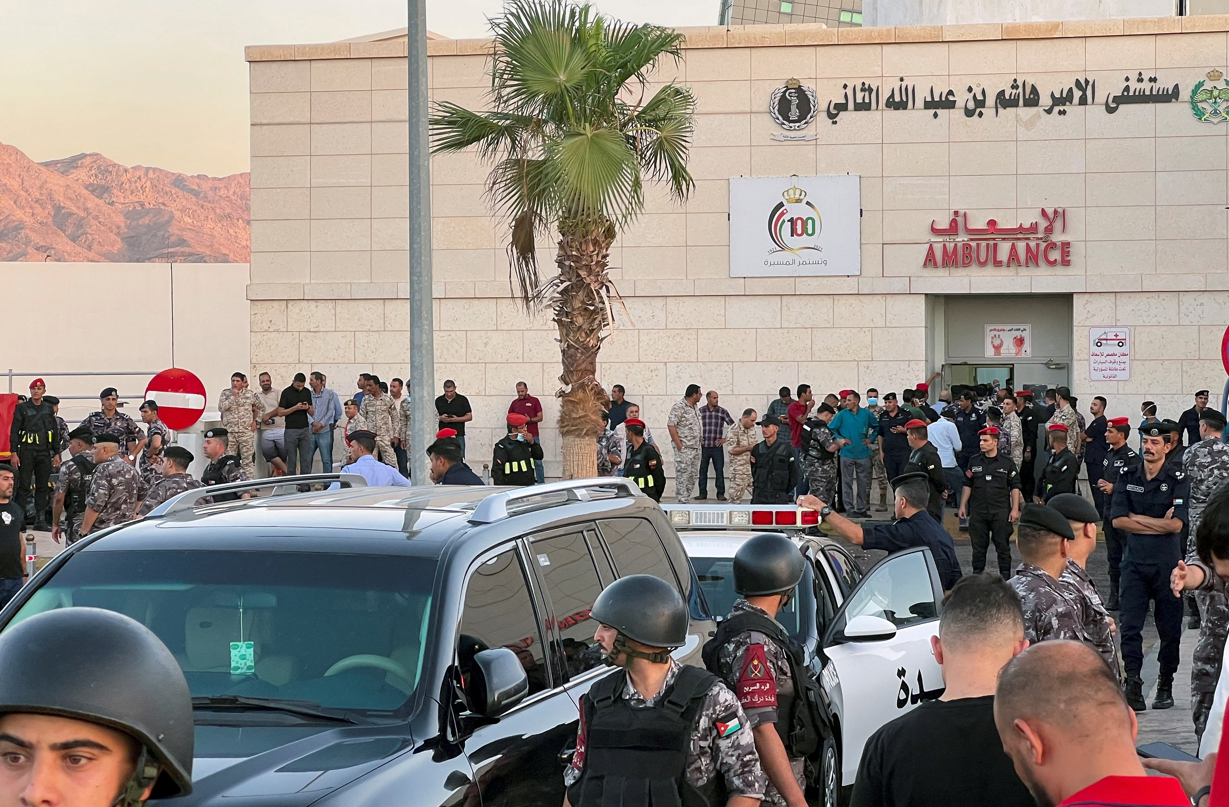 Members of the Jordanian Gendarmerie stand outside a hospital after toxic gas leak from a storage tank in Jordan's Aqaba port