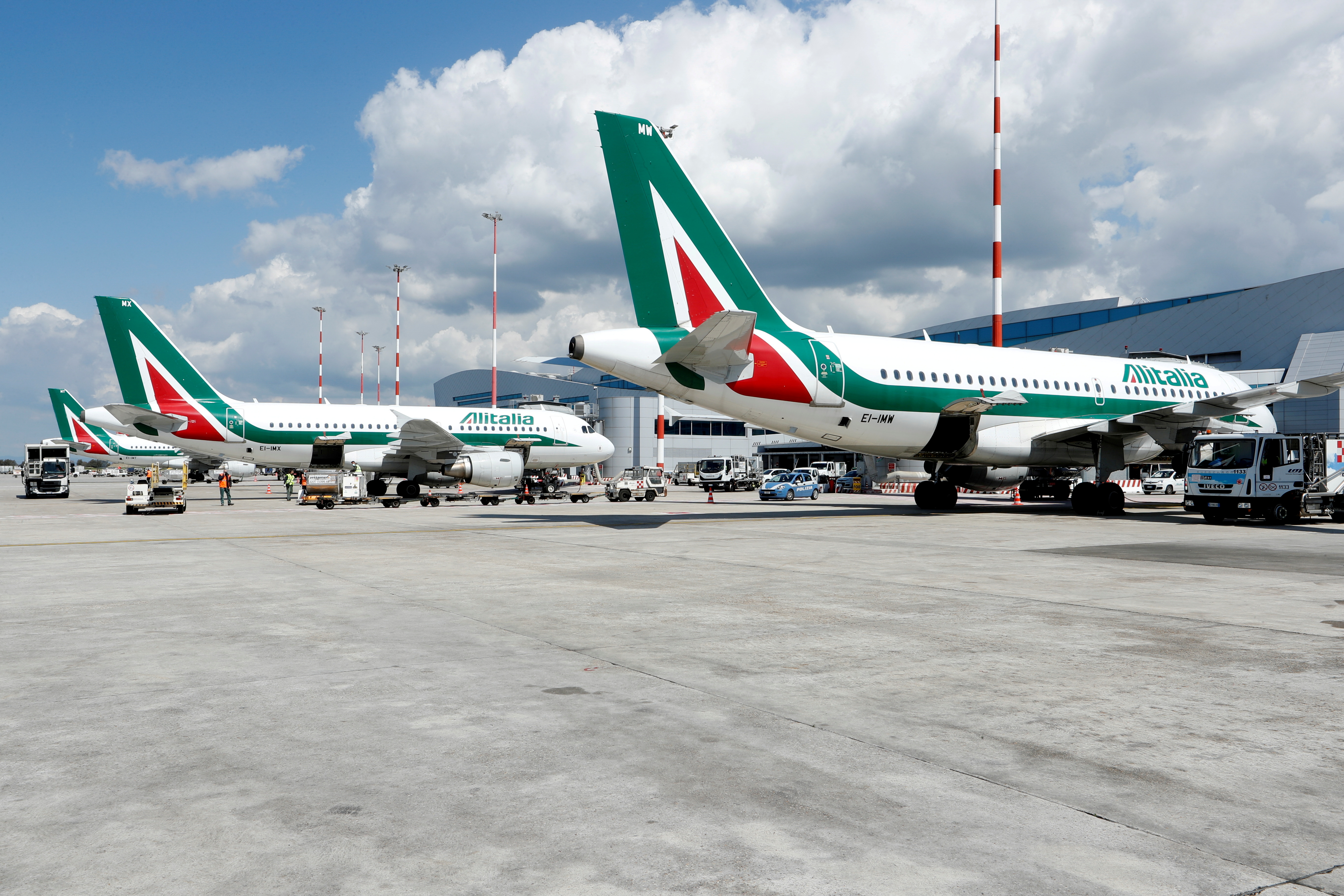 Alitalia planes are seen on the tarmac at Fiumicino International Airport as talks between Italy and the European Commission over the revamp of Alitalia are due to enter a key phase, in Rome, Italy, April 15, 2021. REUTERS/Remo Casilli