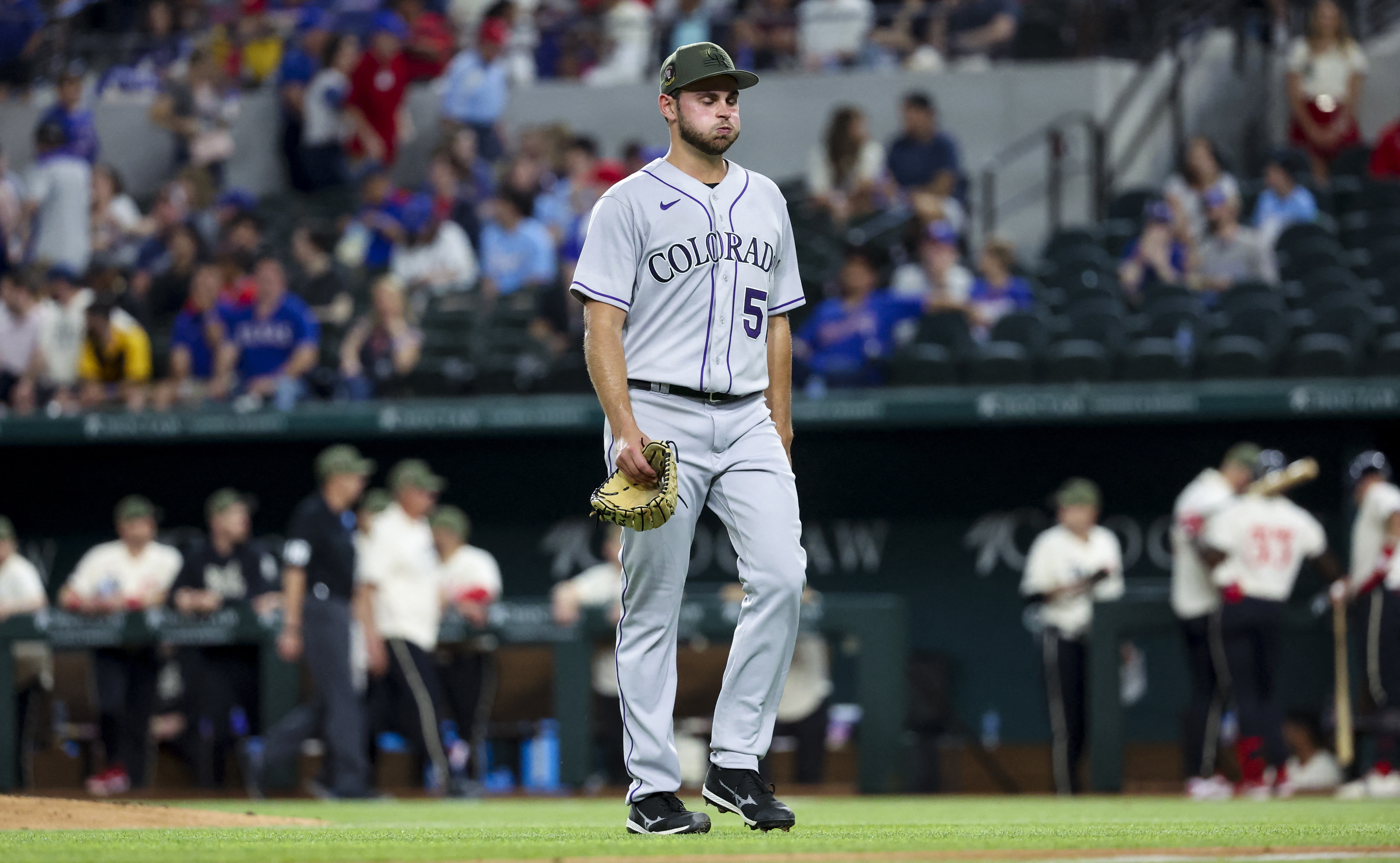 Rockies lose to Rangers, 7-2, in Karl Kauffmann's big-league debut