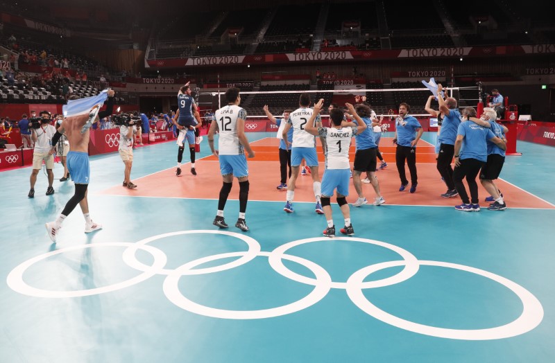 Tokyo 2020 Olympics - Volleyball - Men's Bronze medal match - Argentina v Brazil - Ariake Arena, Tokyo, Japan – August 7, 2021. Team members of Argentina celebrate. REUTERS/Valentyn Ogirenko