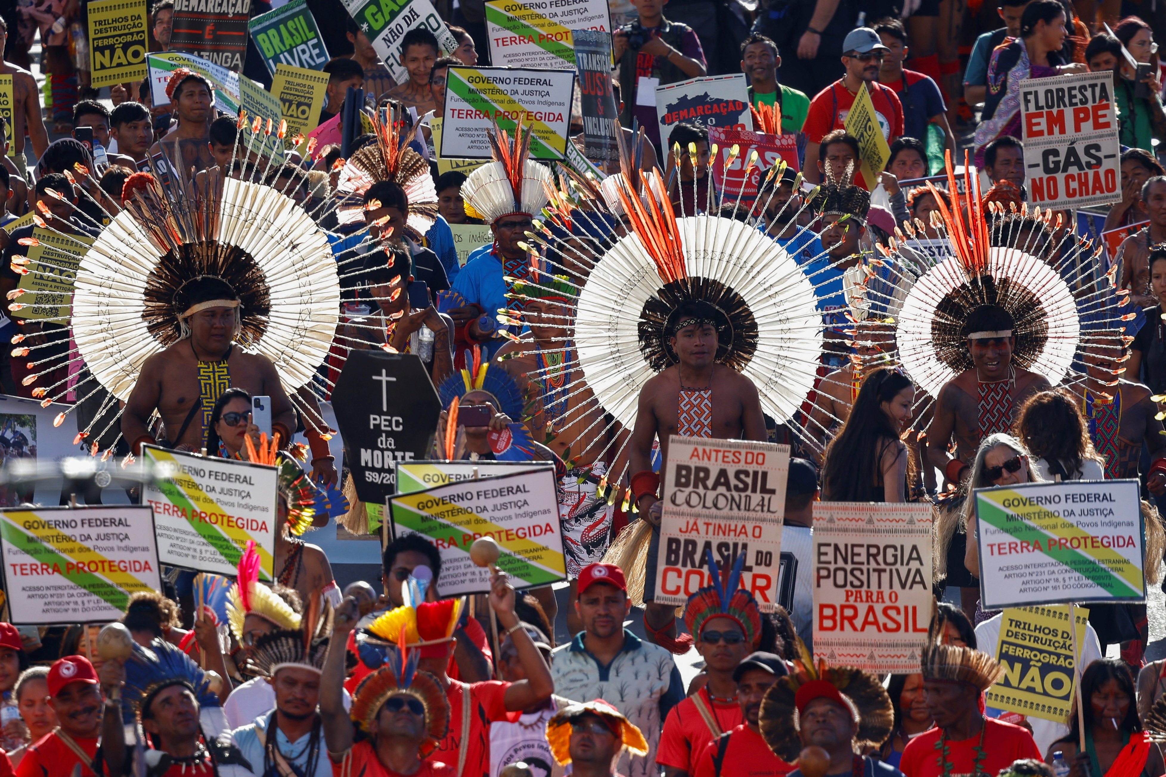 Indigenous people protest Brazil not protecting ancestral lands | Reuters