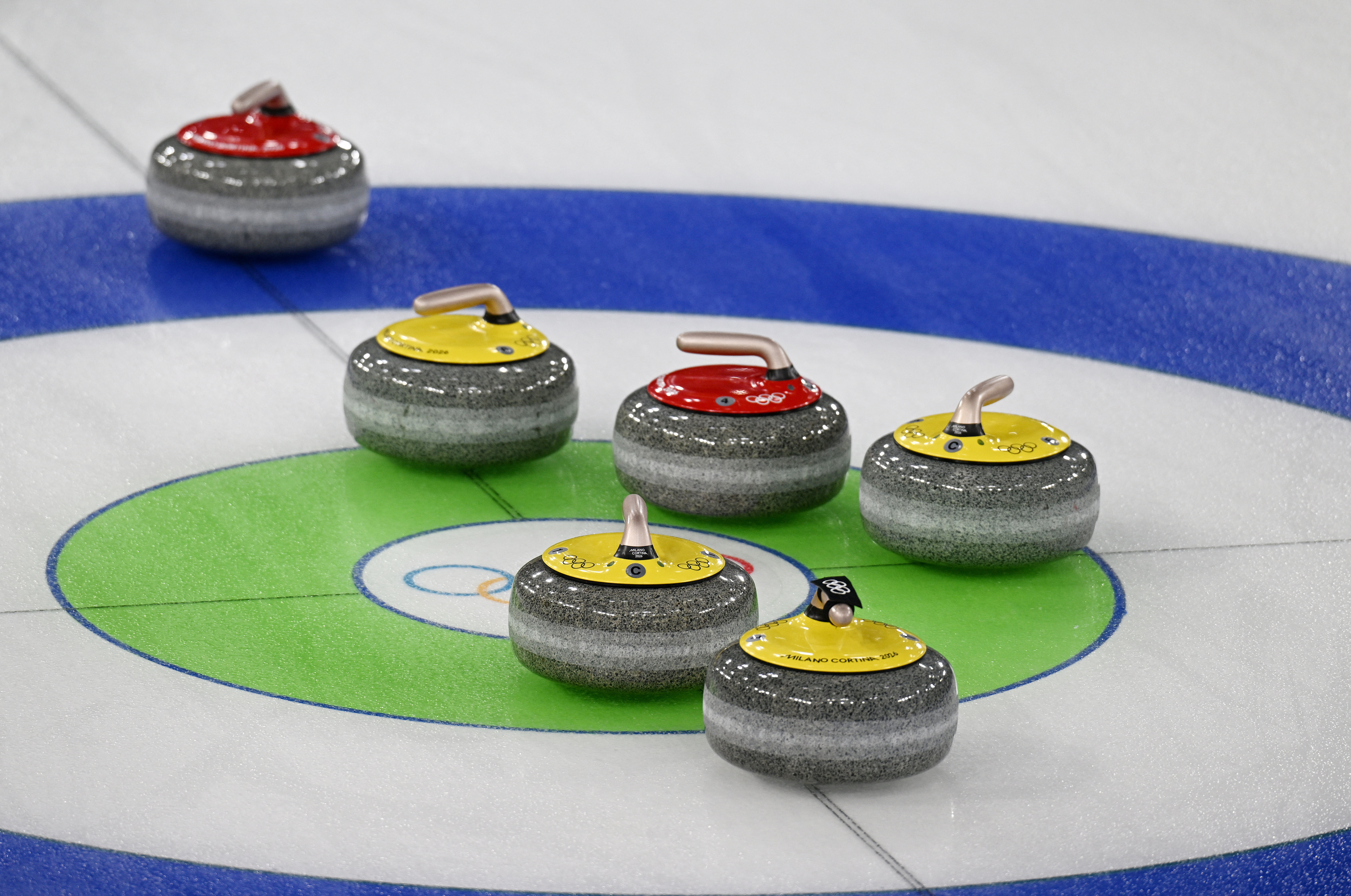 Curling-Electronic handles are a hit at Milano Cortina Games | Reuters