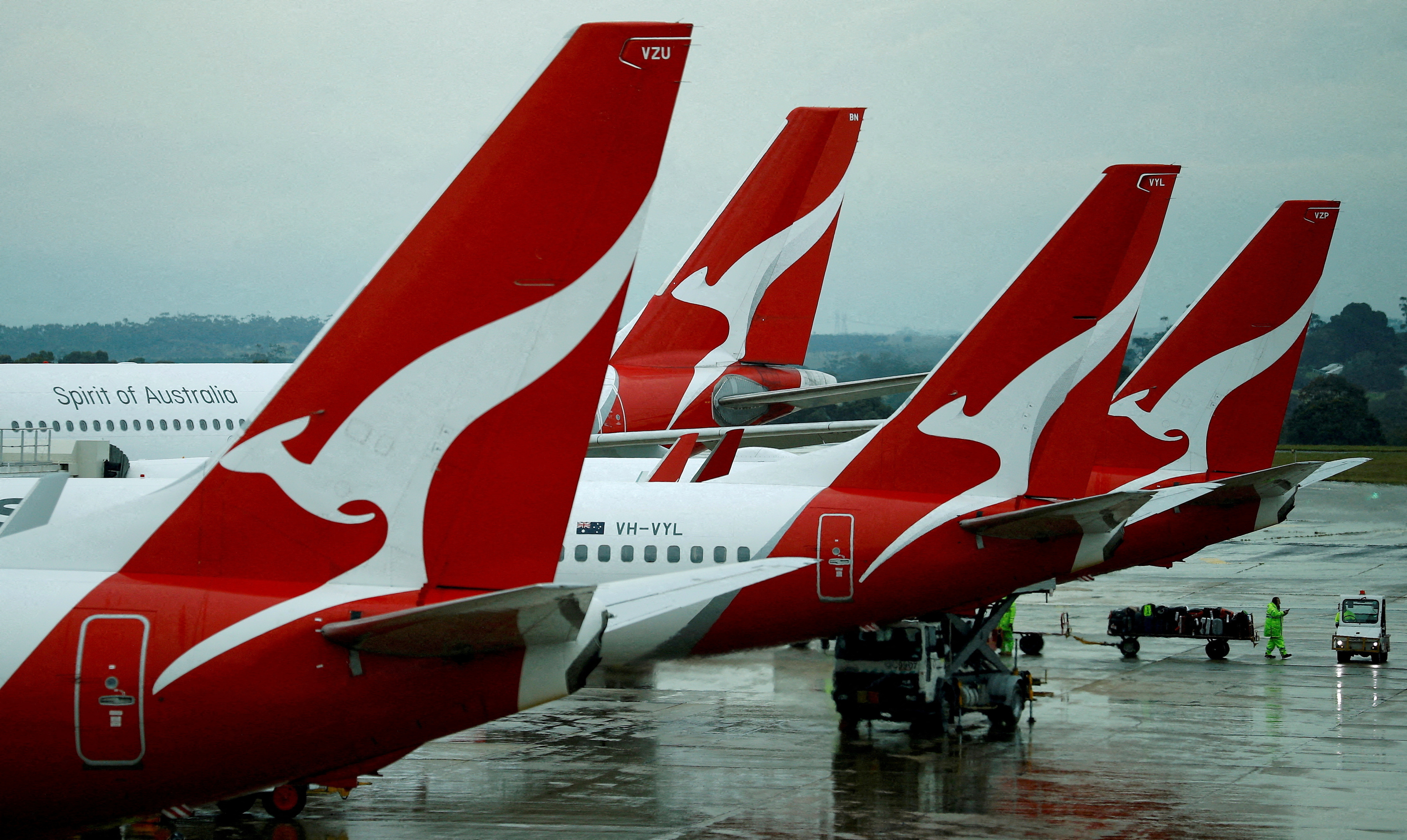 Qantas aircraft are seen on the tarmac at Melbourne International Airport in Melbourne