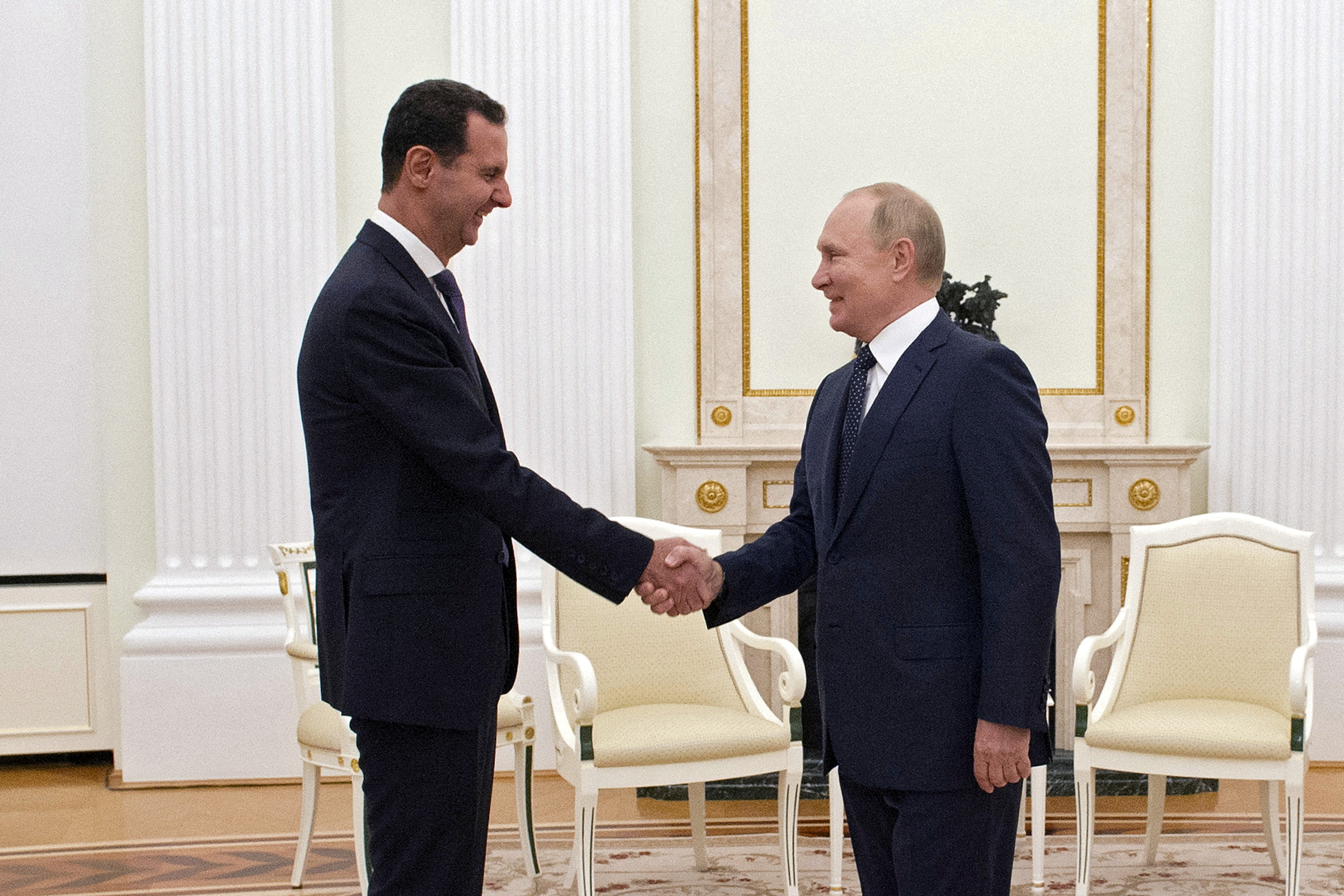 Russian President Vladimir Putin meets with Syrian President Bashar al-Assad in Moscow
