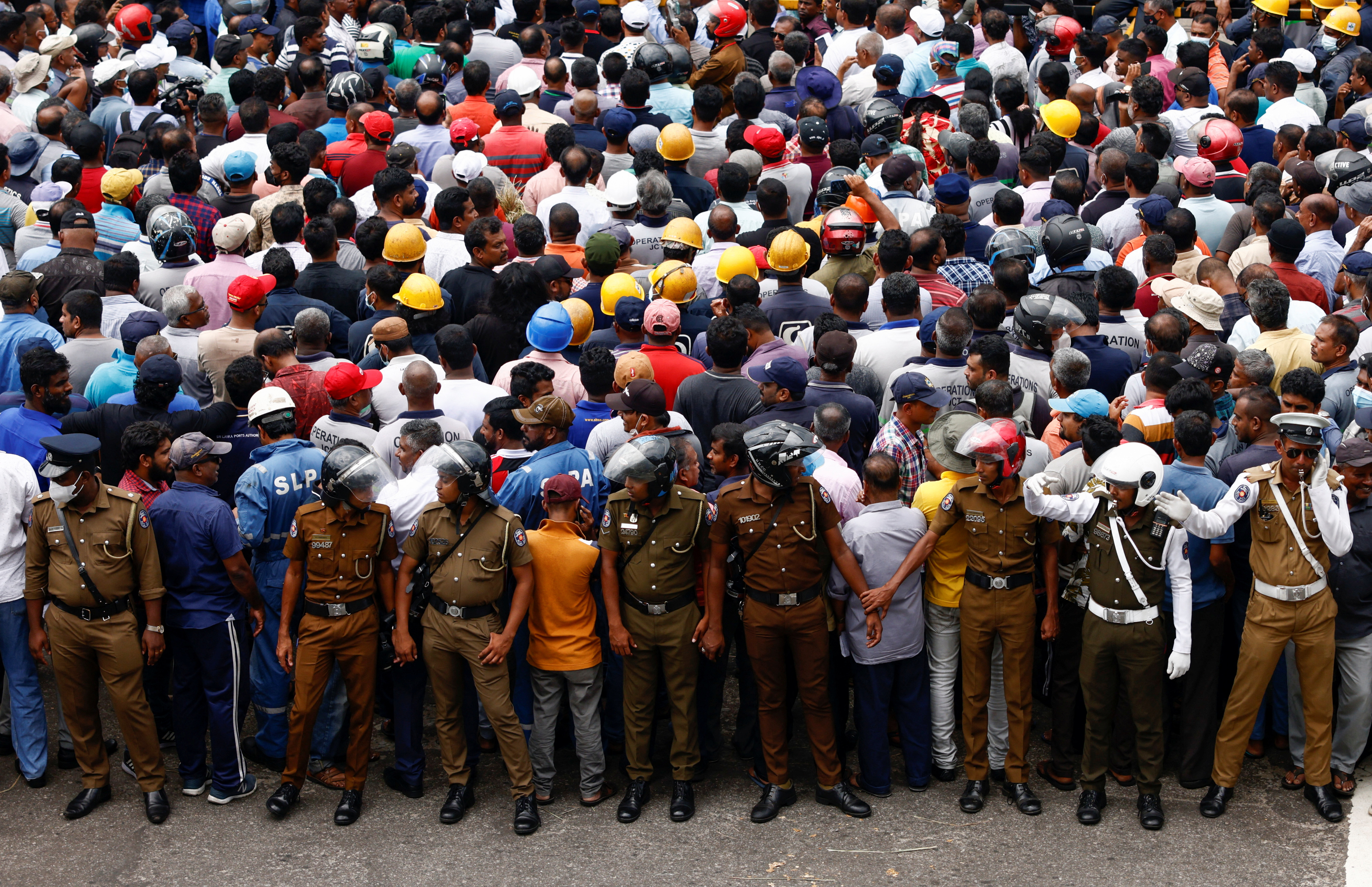 Workers stage a strike protesting huge tax increase in Colombo