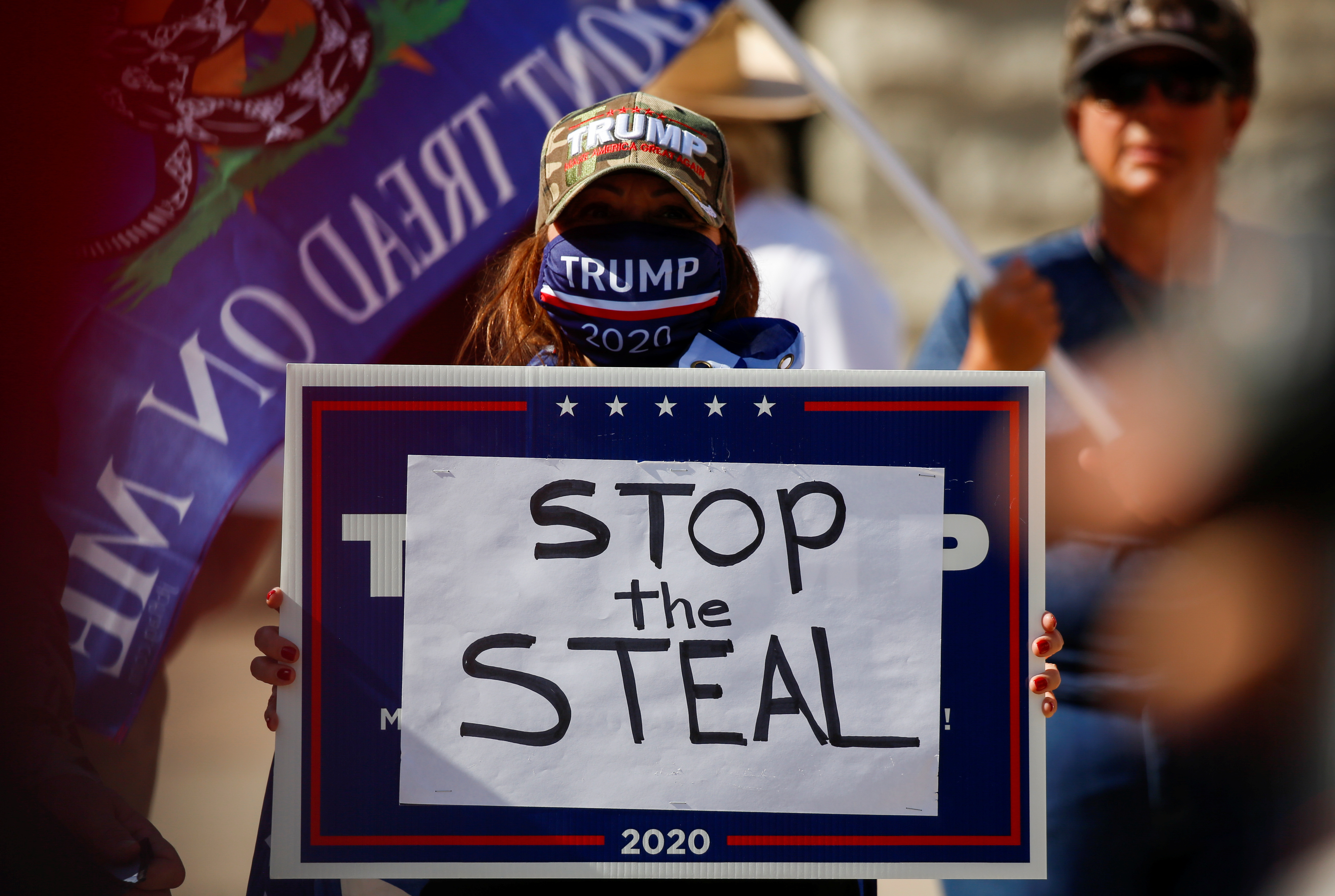 Supporters of U.S. President Donald Trump gather at a "Stop the Steal" protest after the 2020 U.S. presidential election was called by the media for Democratic candidate Joe Biden, in Phoenix