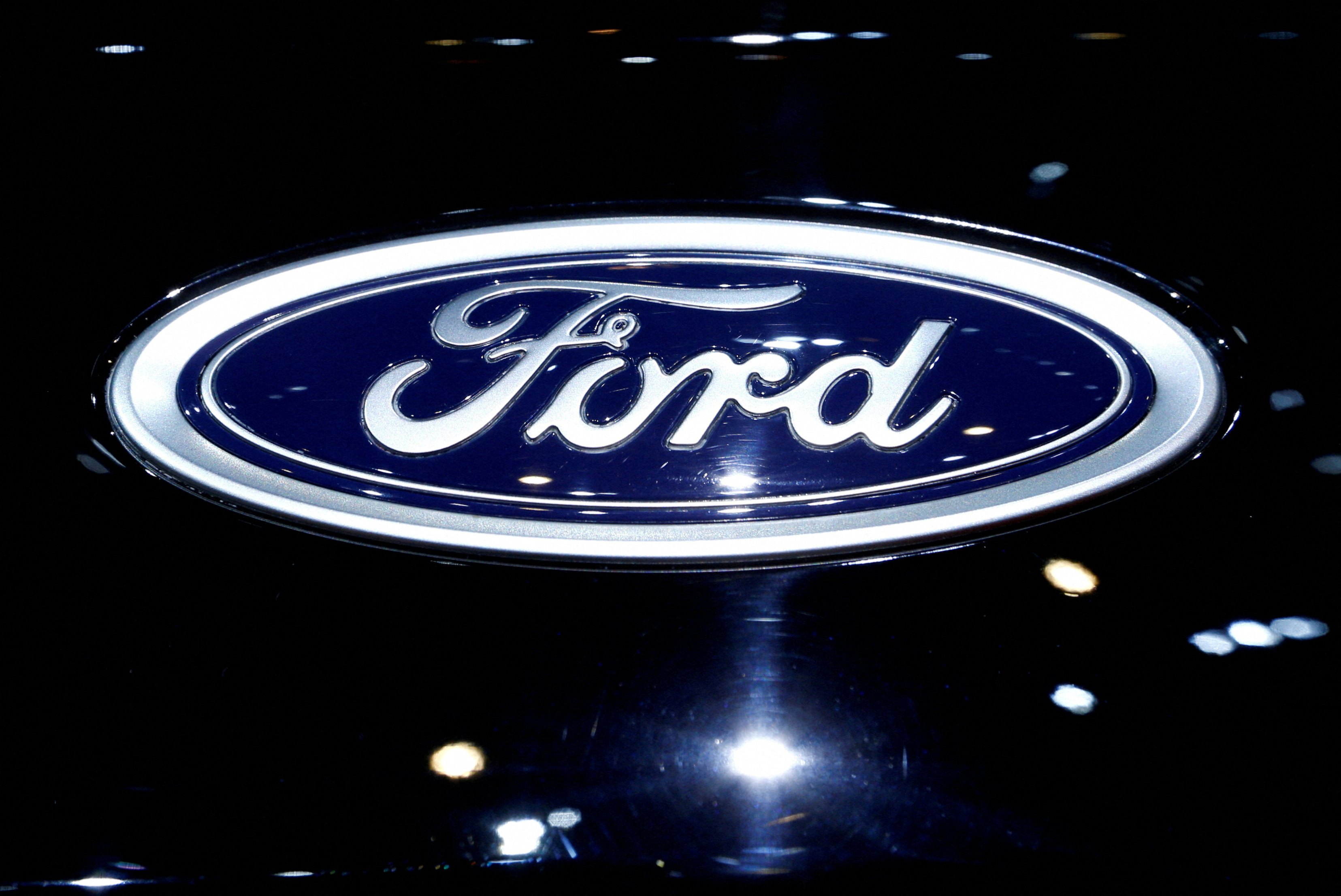 A logo of Ford is pictured on a car at an event in Switzerland