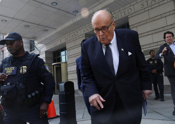 Rudy Giuliani exits U.S. District Court after a hearing in a defamation suit against him in Washington