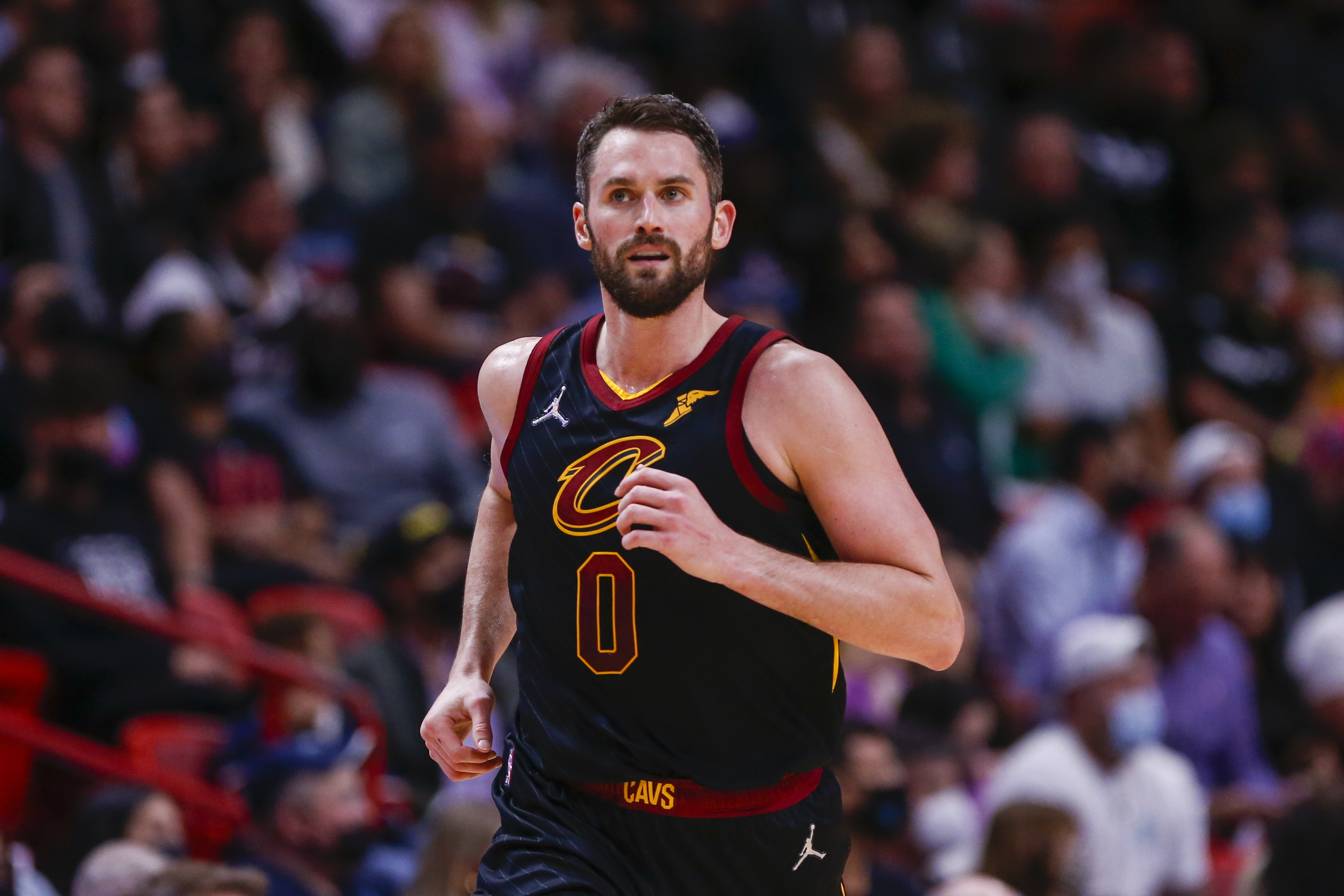 Dec 1, 2021; Miami, Florida, USA; Cleveland Cavaliers forward Kevin Love (0) runs down the court after scoring against the Miami Heat during the fourth quarter at FTX Arena. Mandatory Credit: Sam Navarro-USA TODAY Sports