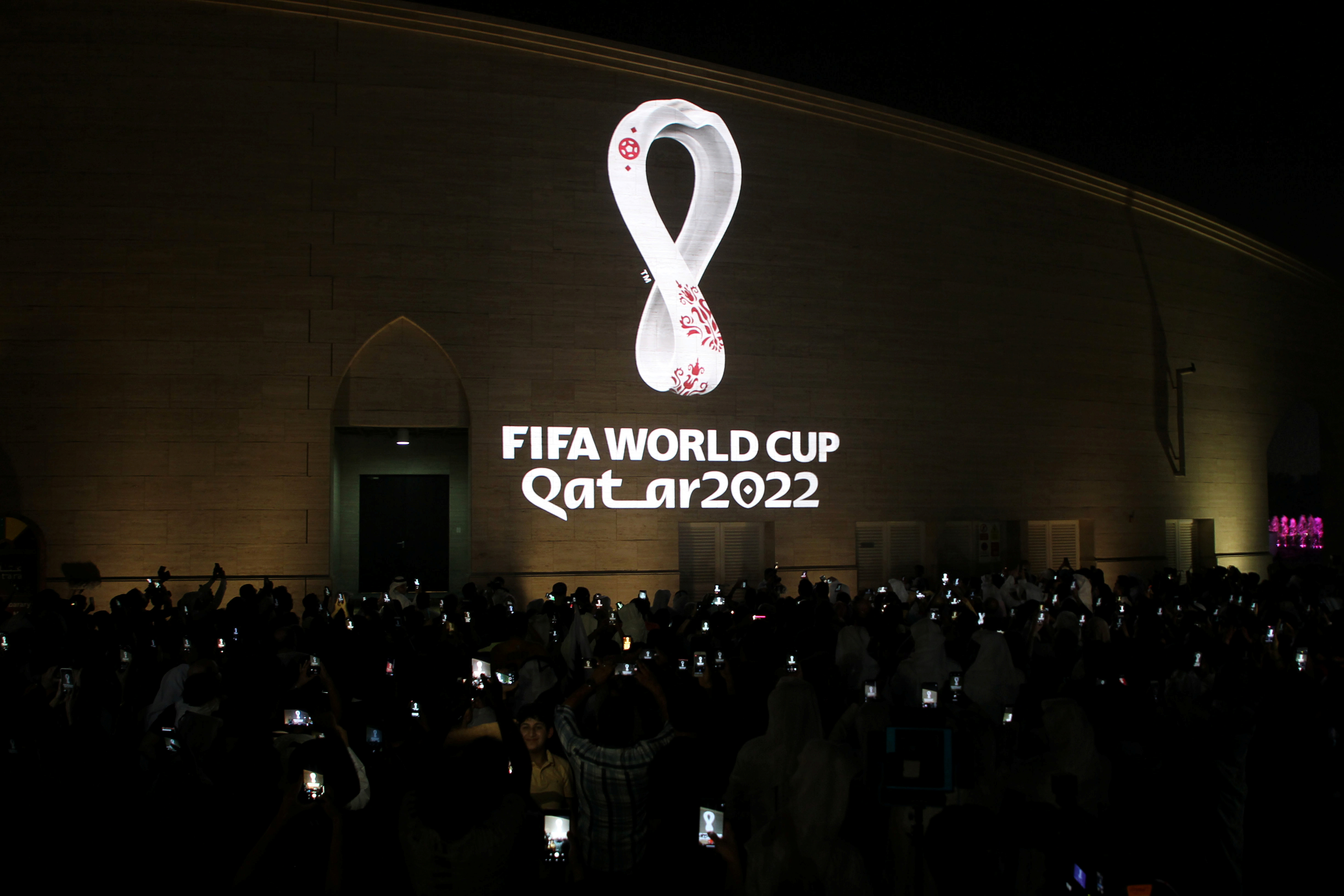 The tournament's official logo for the 2022 Qatar World Cup is seen on the wall of an amphitheater, in Doha