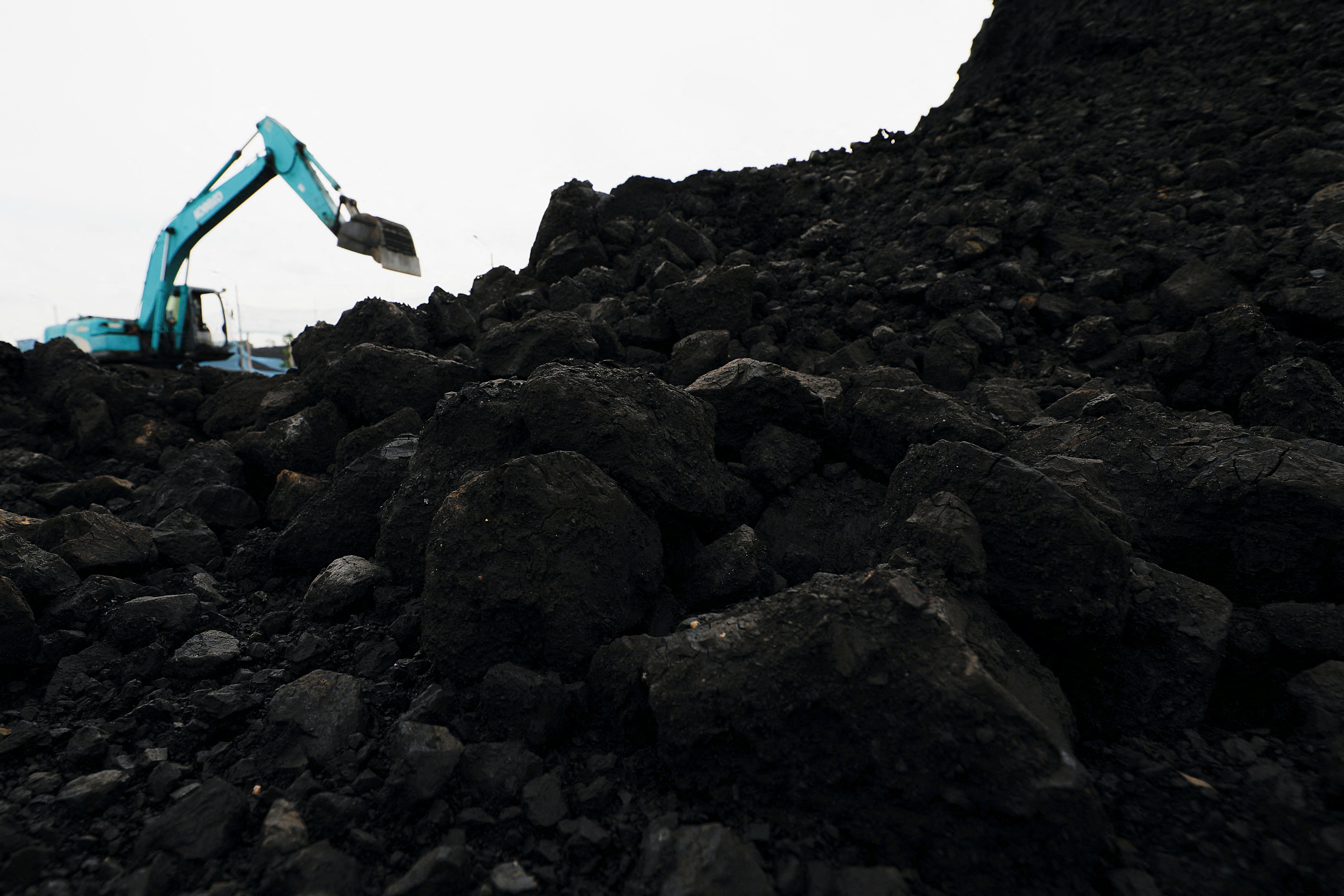 Coal unloading at Karya Citra Nusantara port in North Jakarta