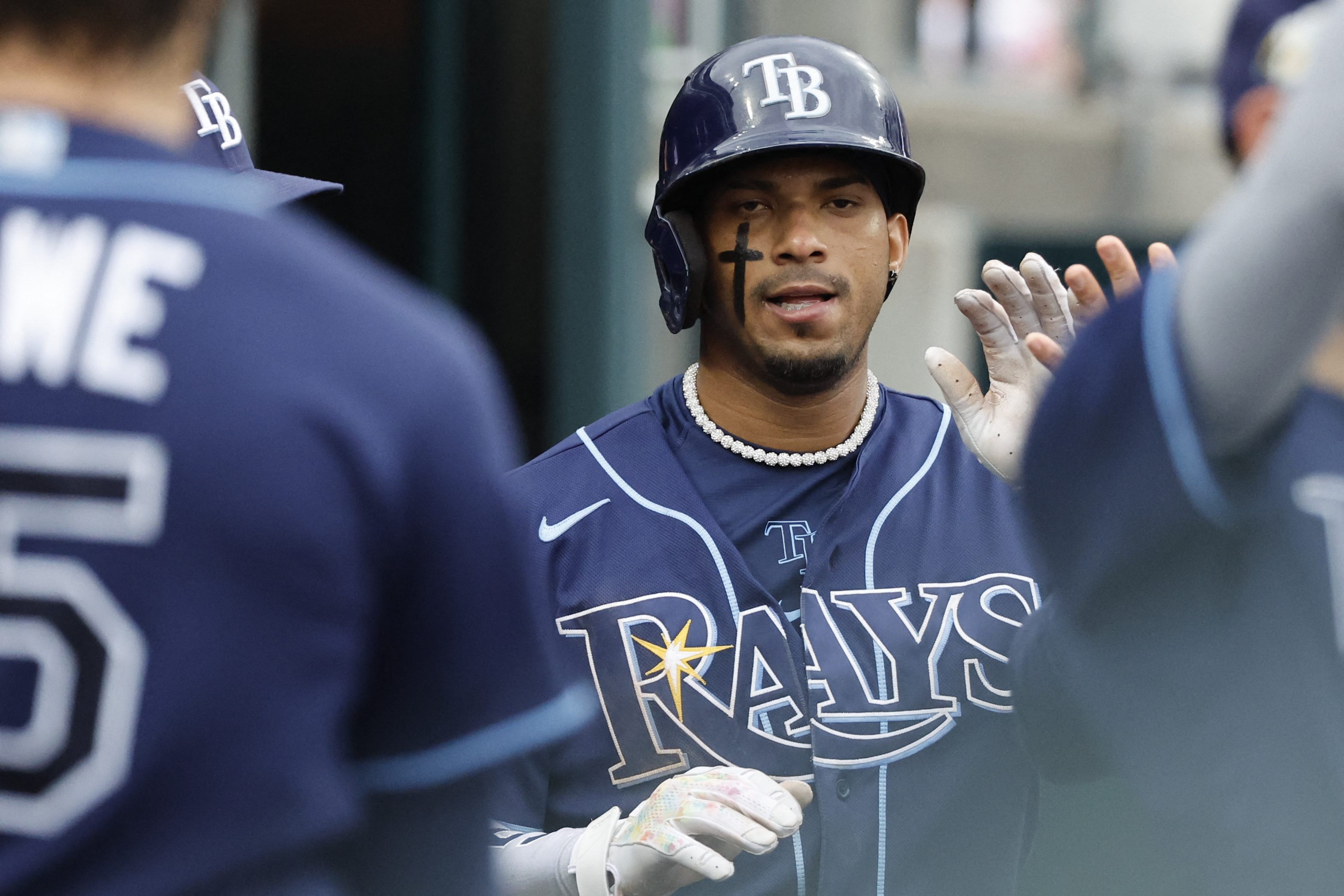 Rays use early offense to outlast Tigers 10-6