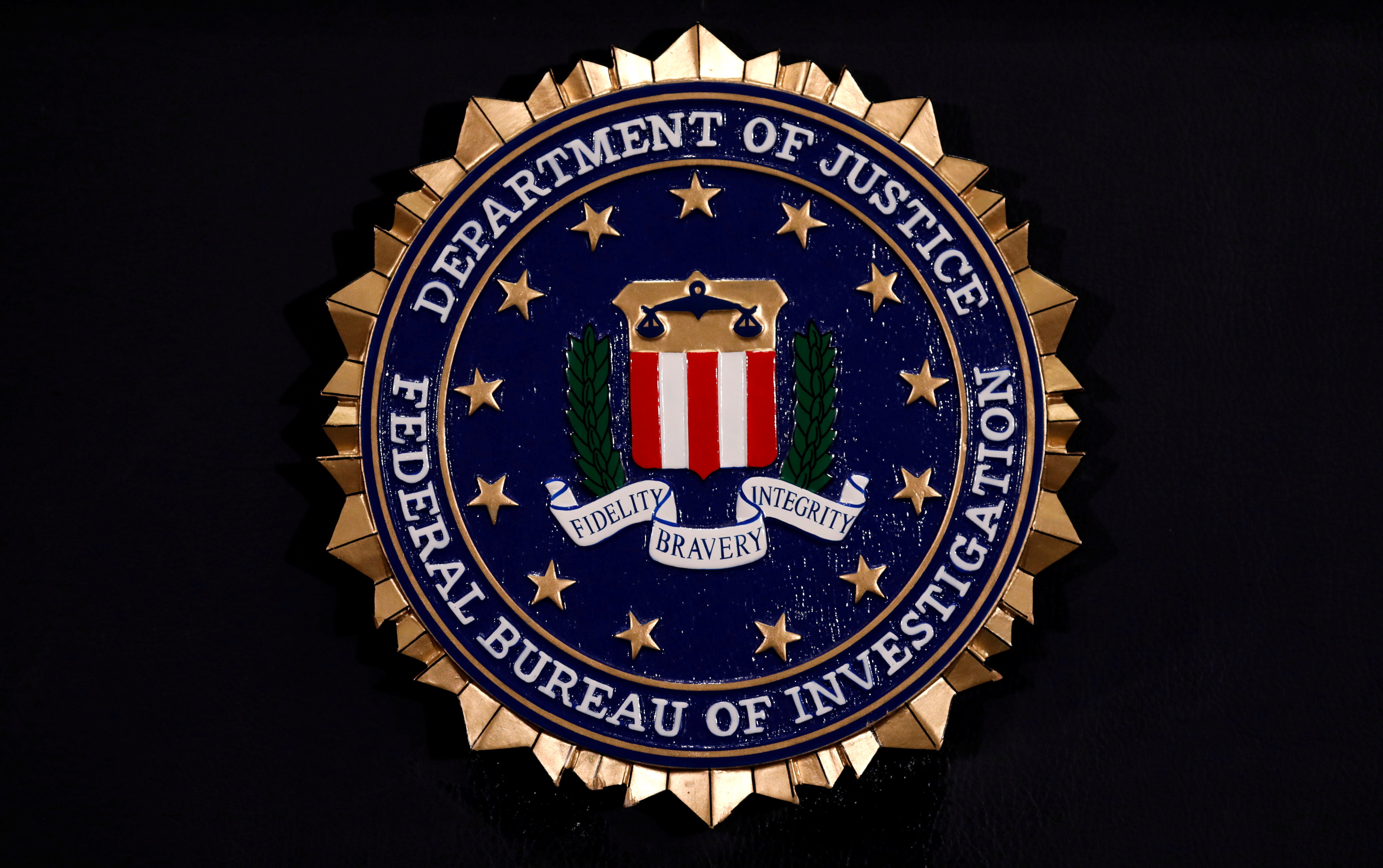 The Federal Bureau Investigation seal is seen at FBI headquarters before a news conference by the FBI director in Washington
