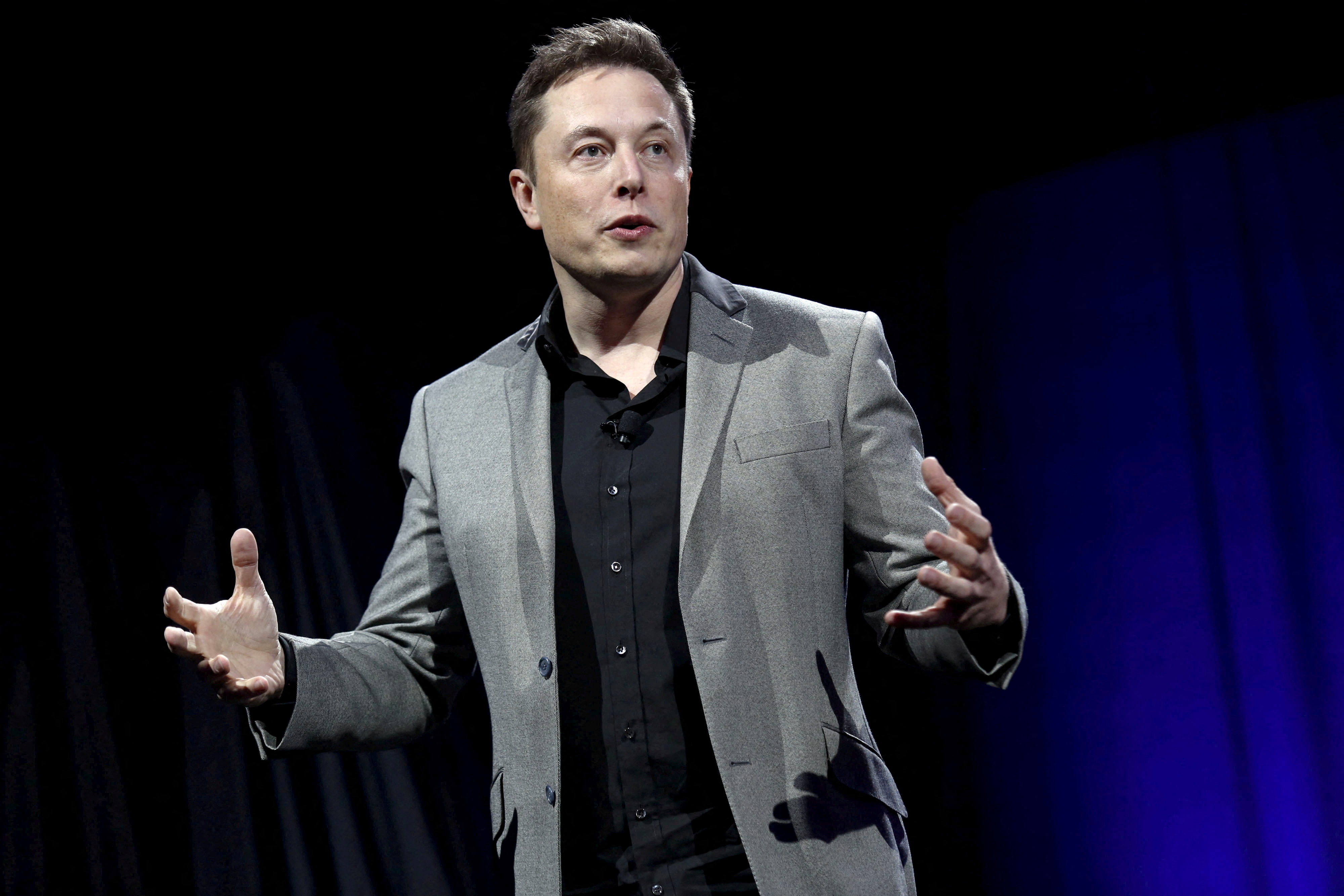 Tesla CEO Elon Musk reveals the Tesla Energy Powerwall Home Battery during an event in Hawthorne, California