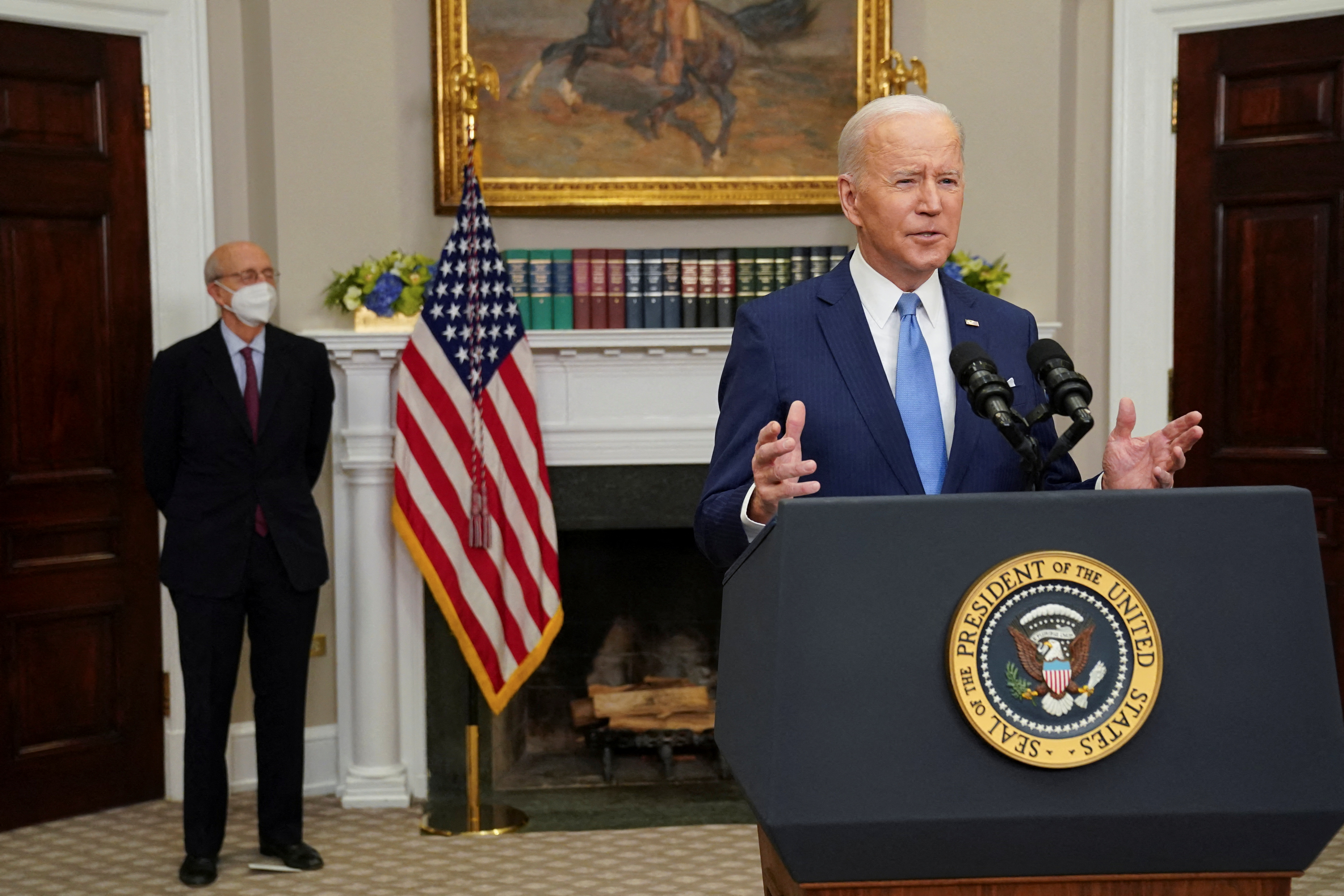 U.S. President Joe Biden delivers remarks with Supreme Court Justice Stephen Breyer as they announce Breyer will retire at the end of the court's current term, at the White House in Washington, U.S., January 27, 2022. REUTERS/Kevin Lamarque