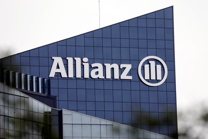 The logo of insurer Allianz SE is seen on the company building in Puteaux at the financial and business district of La Defense near Paris