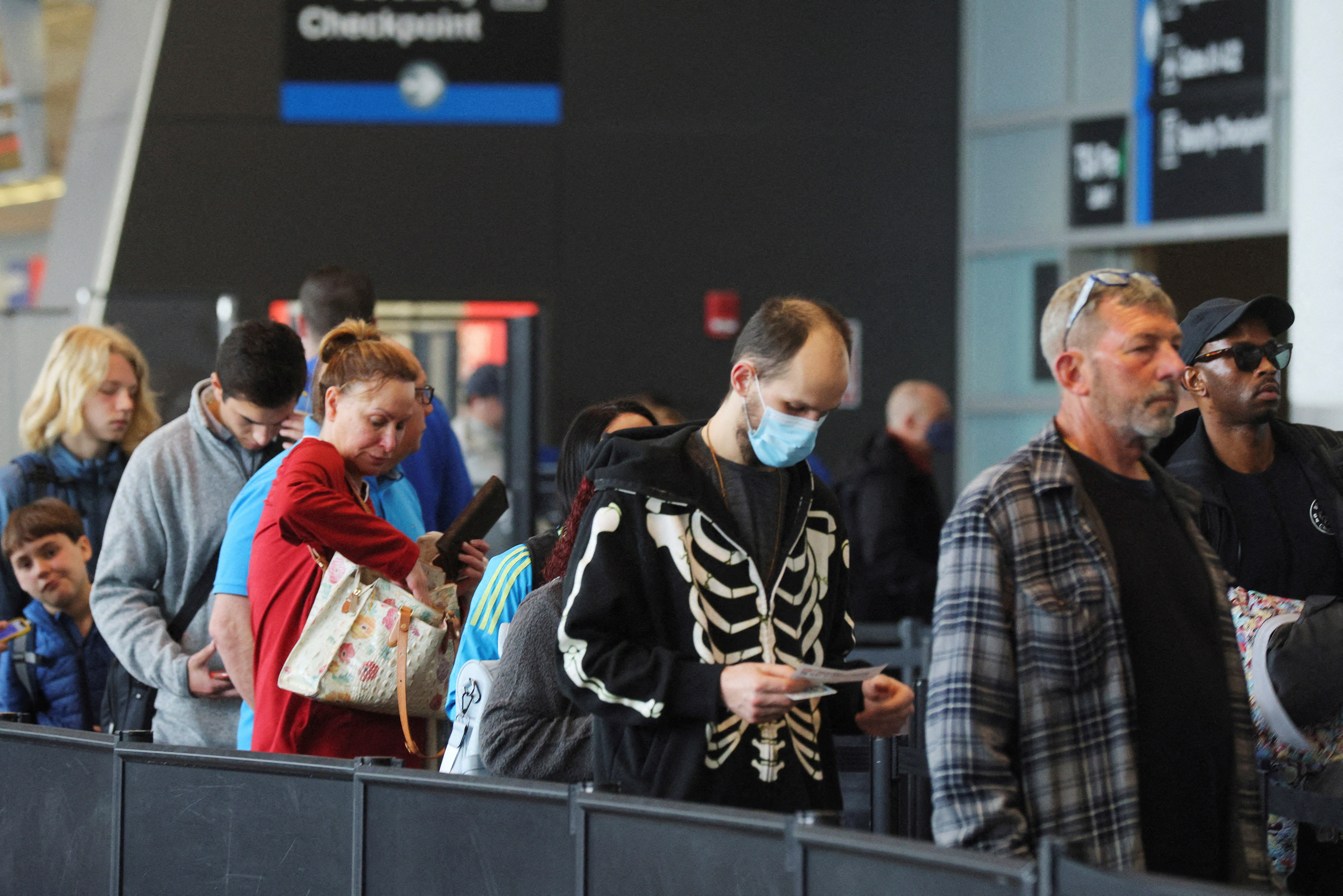 Travellers at Logan Airport in Boston