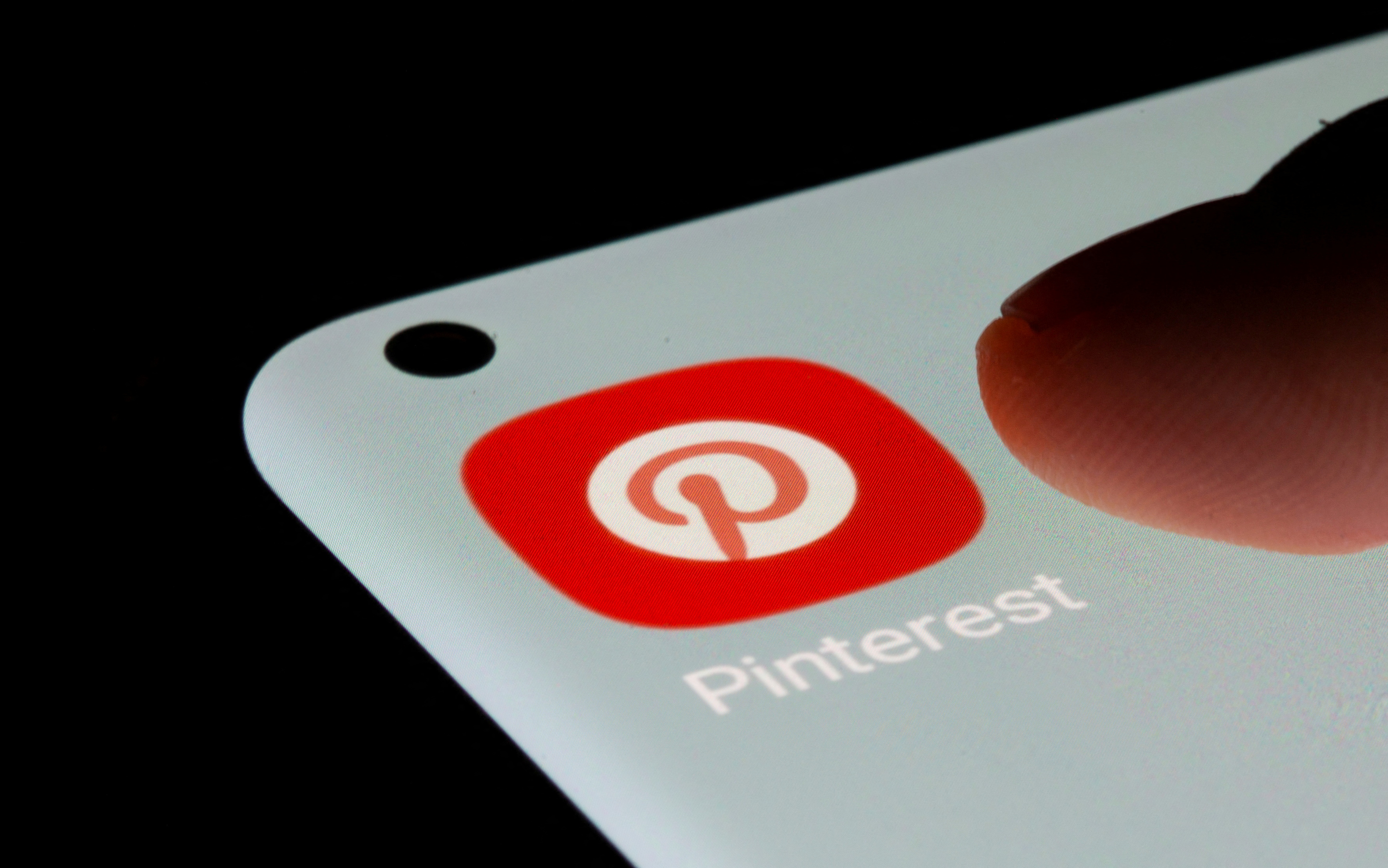 Pinterest app is seen on a smartphone in this illustration