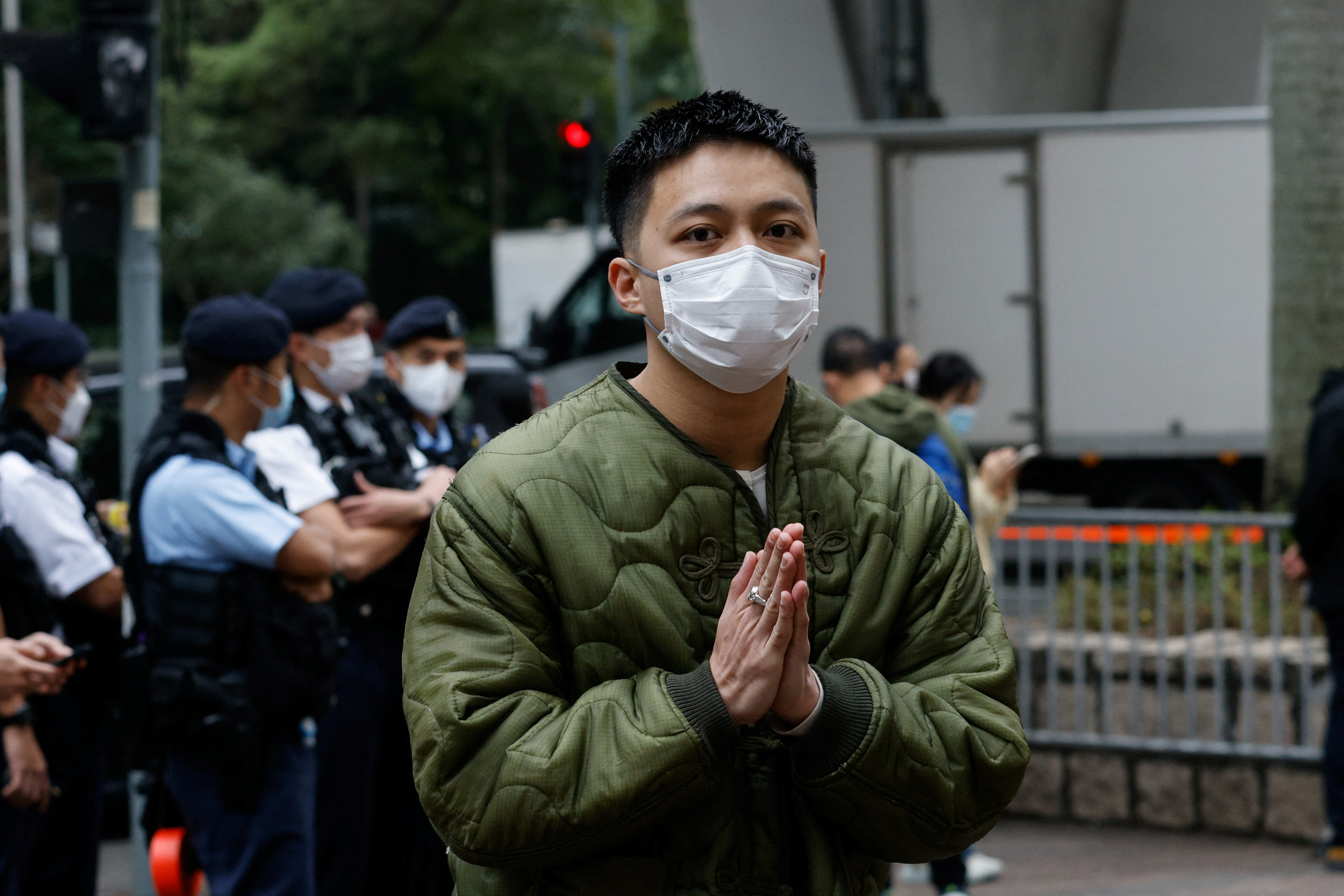 Lee Yue-shun, one of the 47 pro-democracy activists charged with conspiracy to commit subversion under the national security law, arrives at the West Kowloon Magistrates' Courts building in Hong Kong
