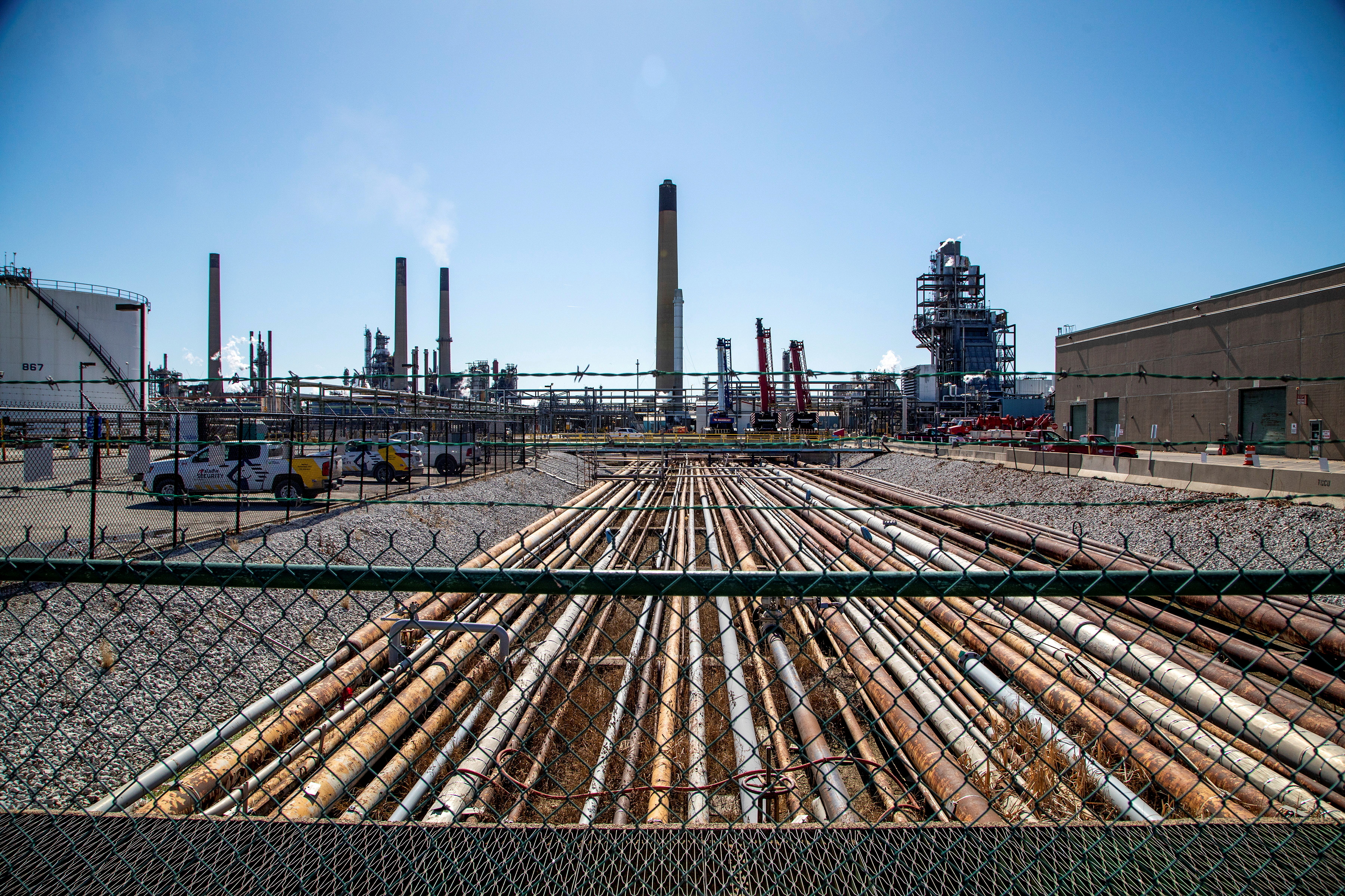 General view of the Imperial Oil refinery, located near Enbridge's Line 5 pipeline, which Michigan Governor Gretchen Whitmer ordered shut down in May 2021, in Sarnia, Ontario, Canada March 20, 2021.  Picture taken through a fence. REUTERS/Carlos Osorio