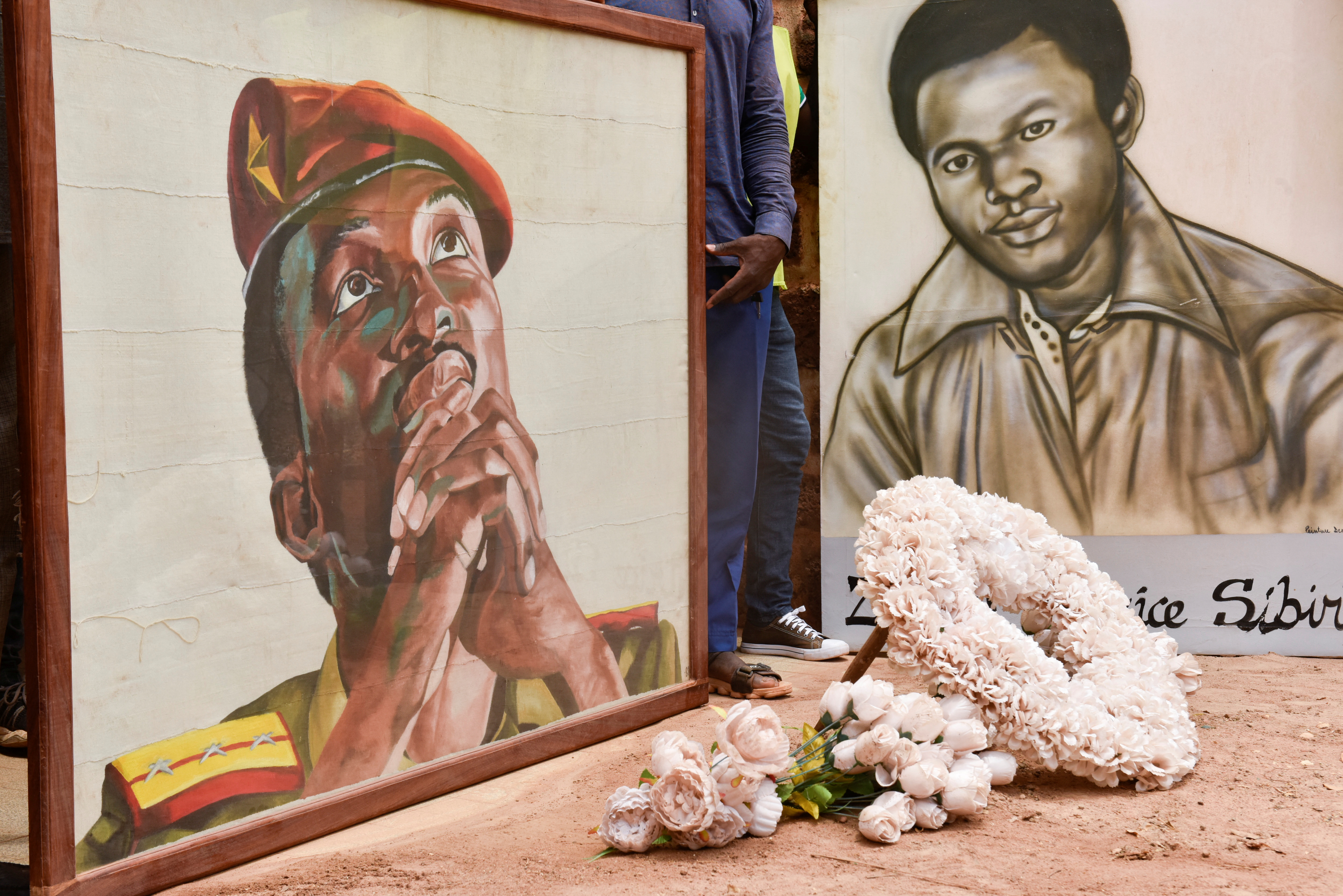 Supporters of the late president Thomas Sankara gather at the his memorial site in Ouagadougou