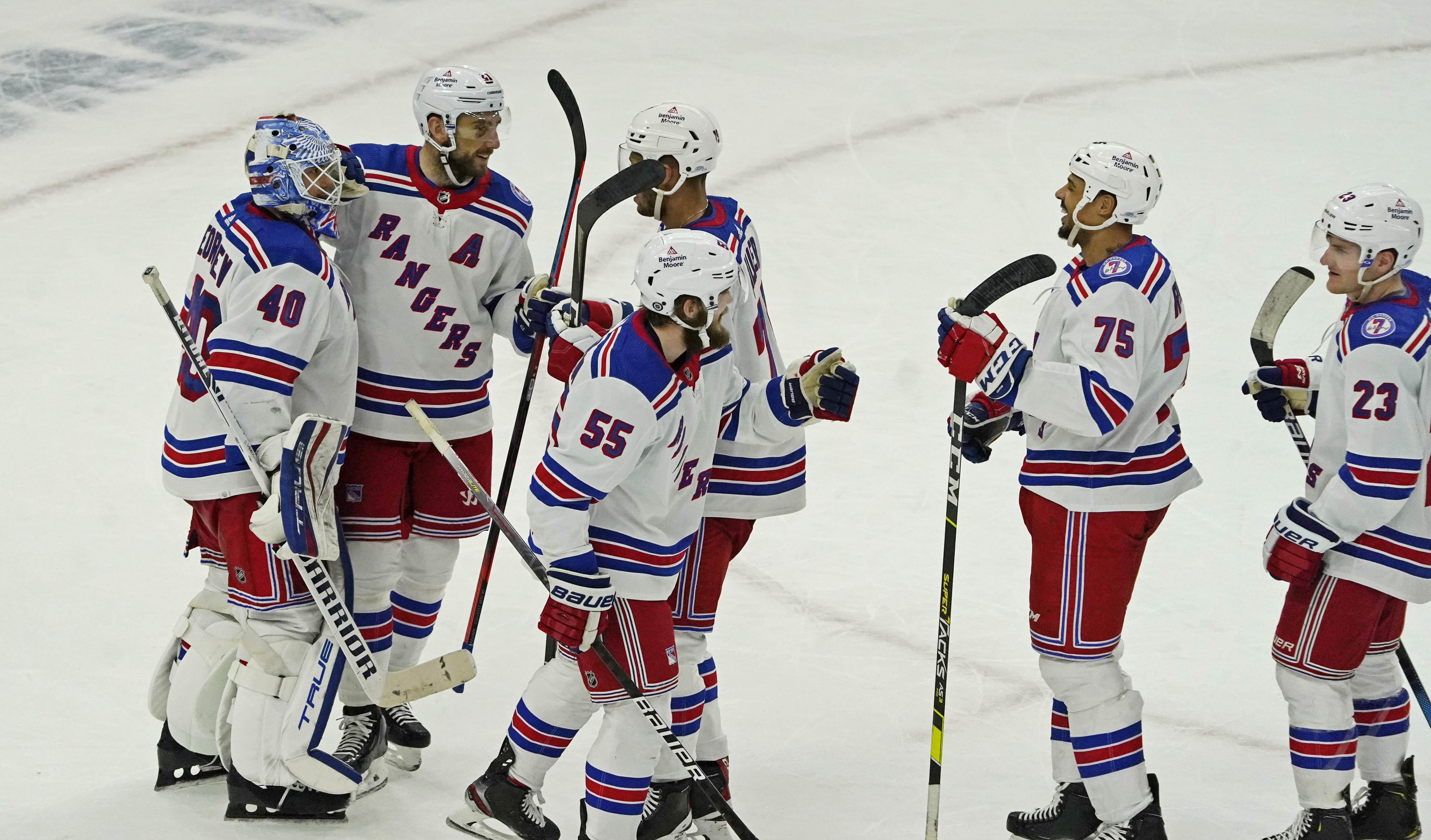 Dec 7, 2021; Chicago, Illinois, USA; The New York Rangers celebrate their win against the Chicago Blackhawks at United Center. Mandatory Credit: David Banks-USA TODAY Sports