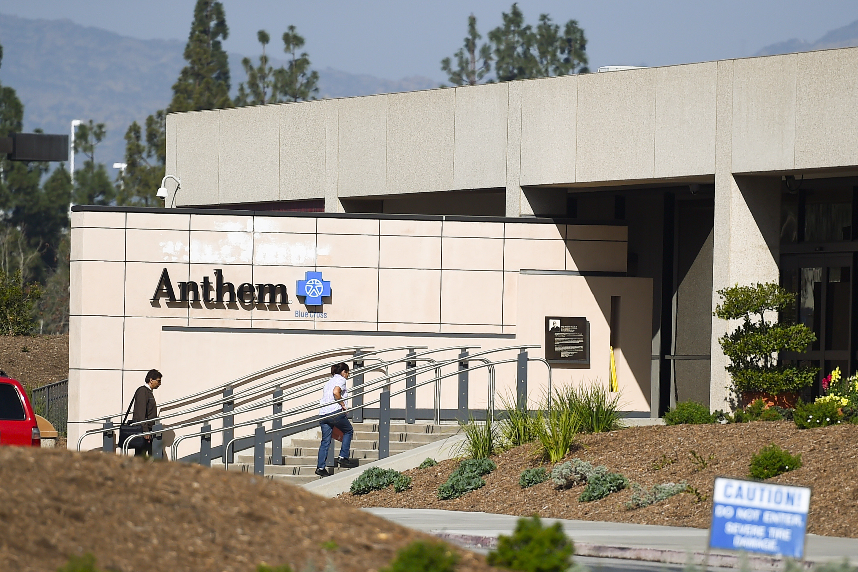 People enter the office building of health insurer Anthem in Los Angeles, California