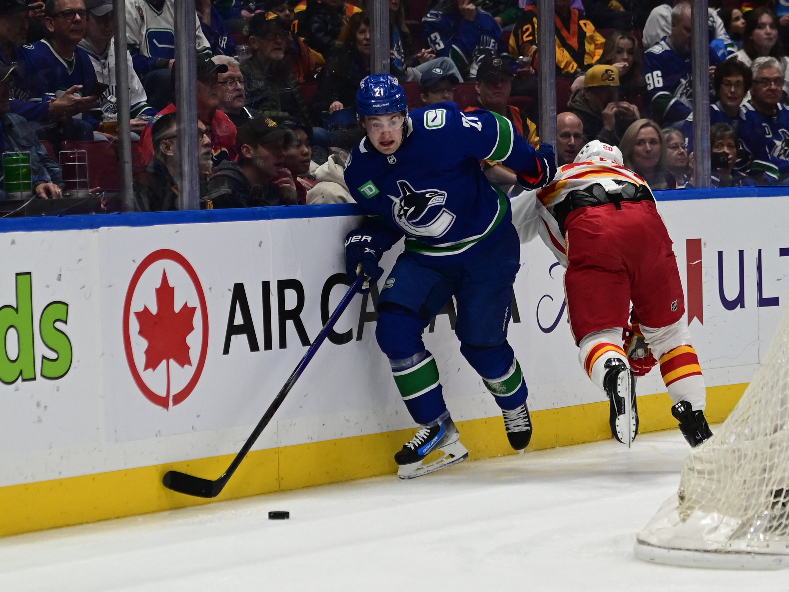 Nils Hoglander Scores Twice As Canucks Top Flames | Reuters