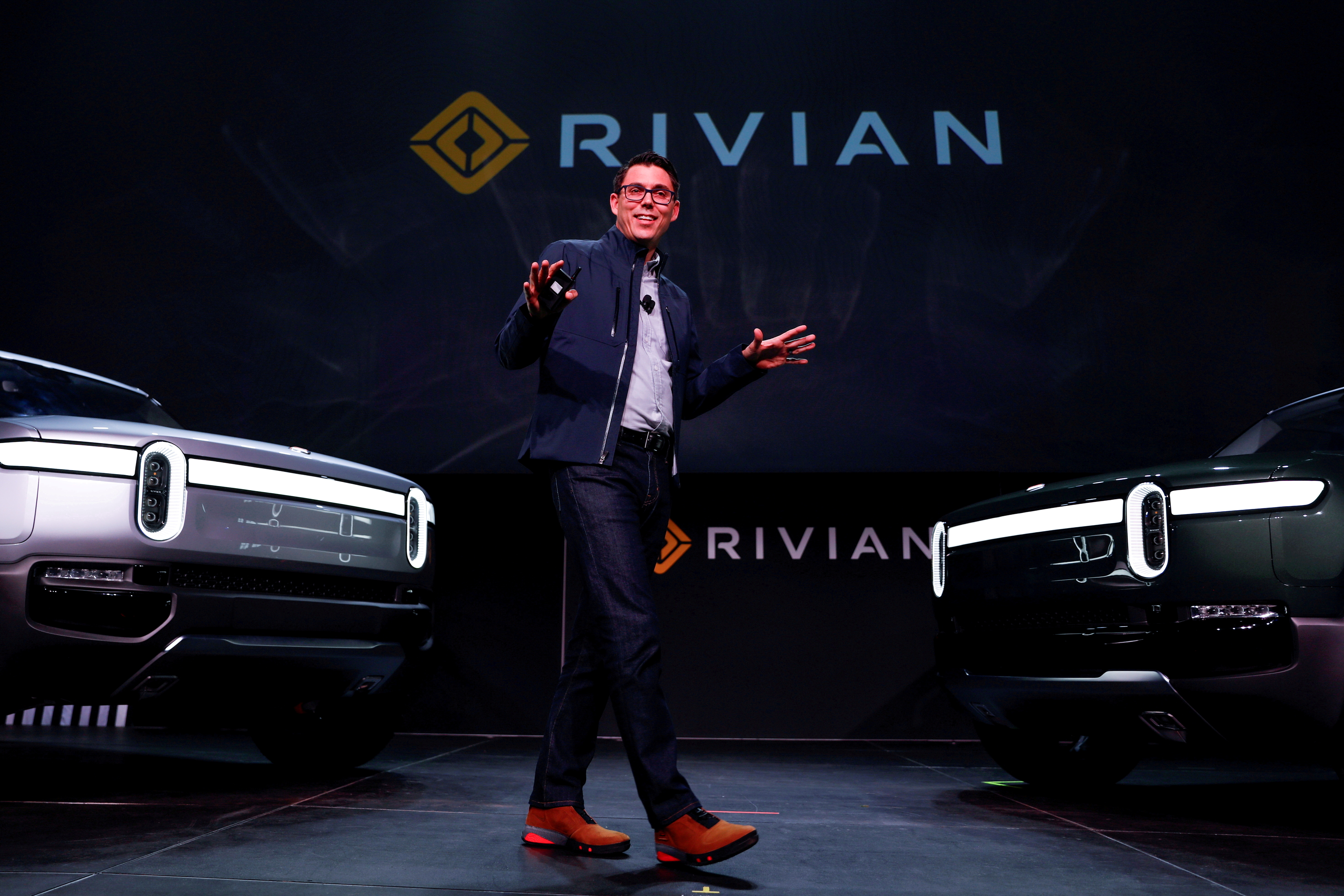 Rivian introduces all-electric pickup and SUV at the LA Auto Show in Los Angeles