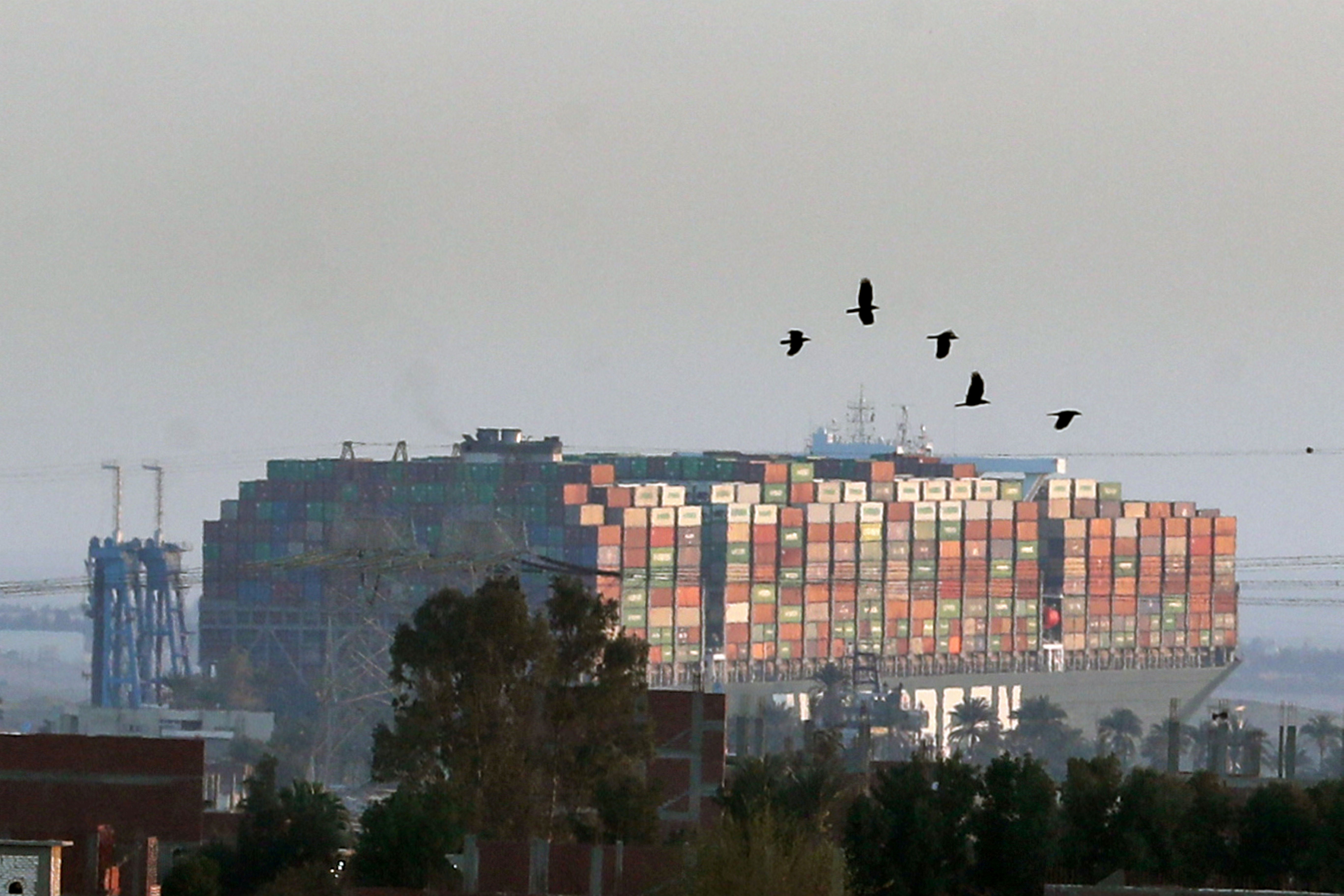Stranded container ship Ever Given, one of the world's largest container ships, is seen after it ran aground, in Suez Canal, Egypt March 26, 2021. REUTERS/Mohamed Abd El Ghany