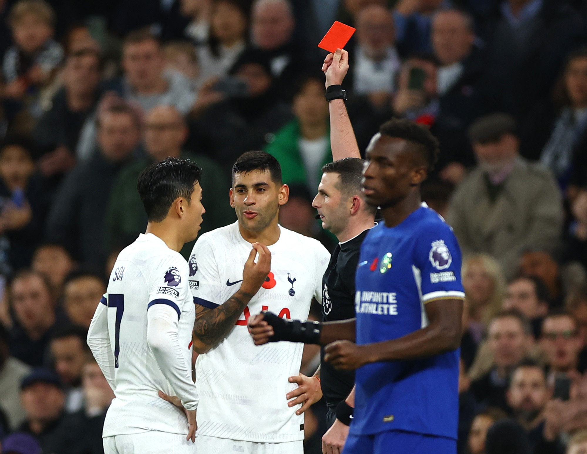 Nine-man Spurs miss out on top spot in chaotic 4-1 loss to Chelsea