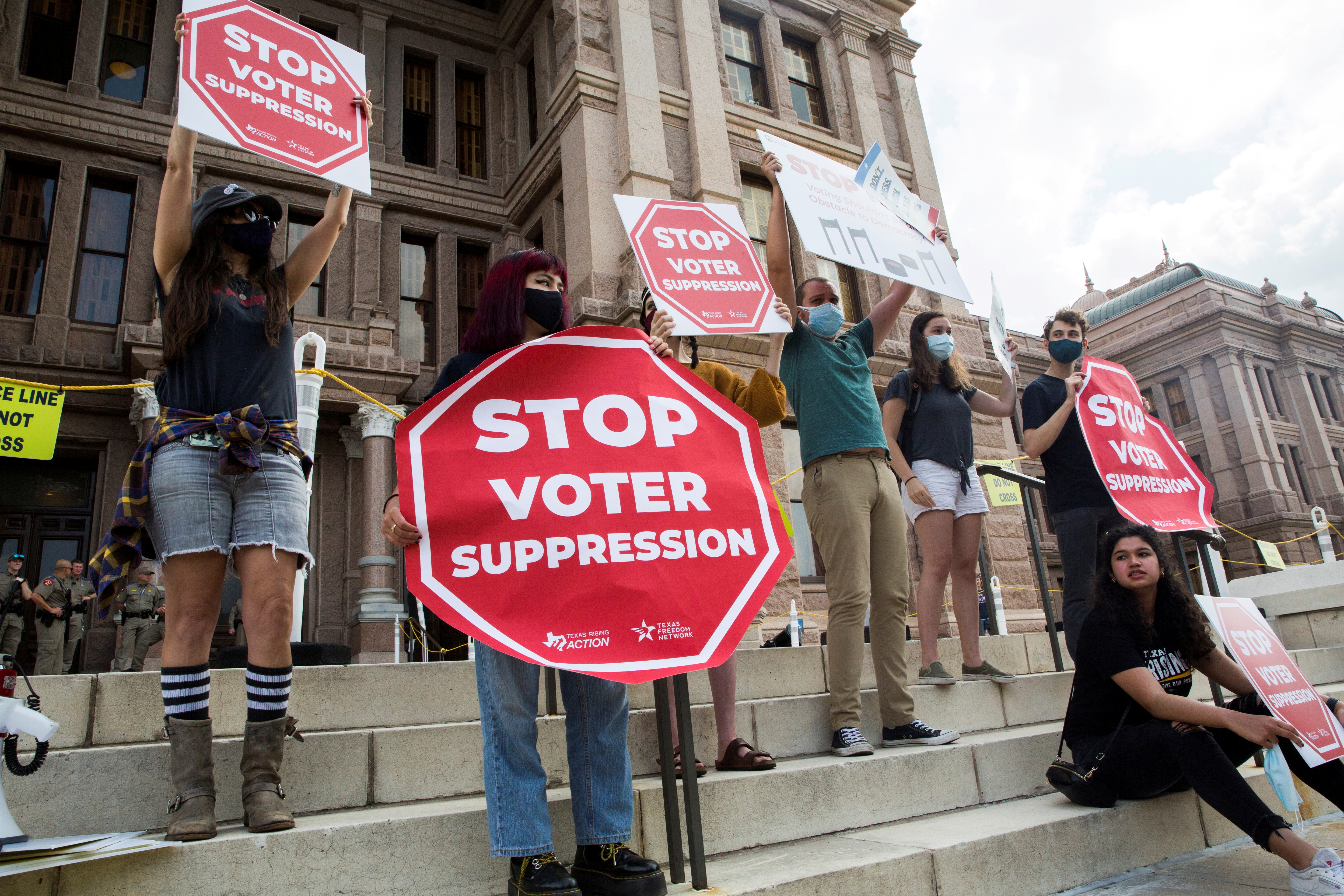 Voting rights activists gather during a protest against Texas legislators who are advancing a slew of new voting restrictions in Austin, Texas, U.S., May 8, 2021.  REUTERS/Mikala Compton