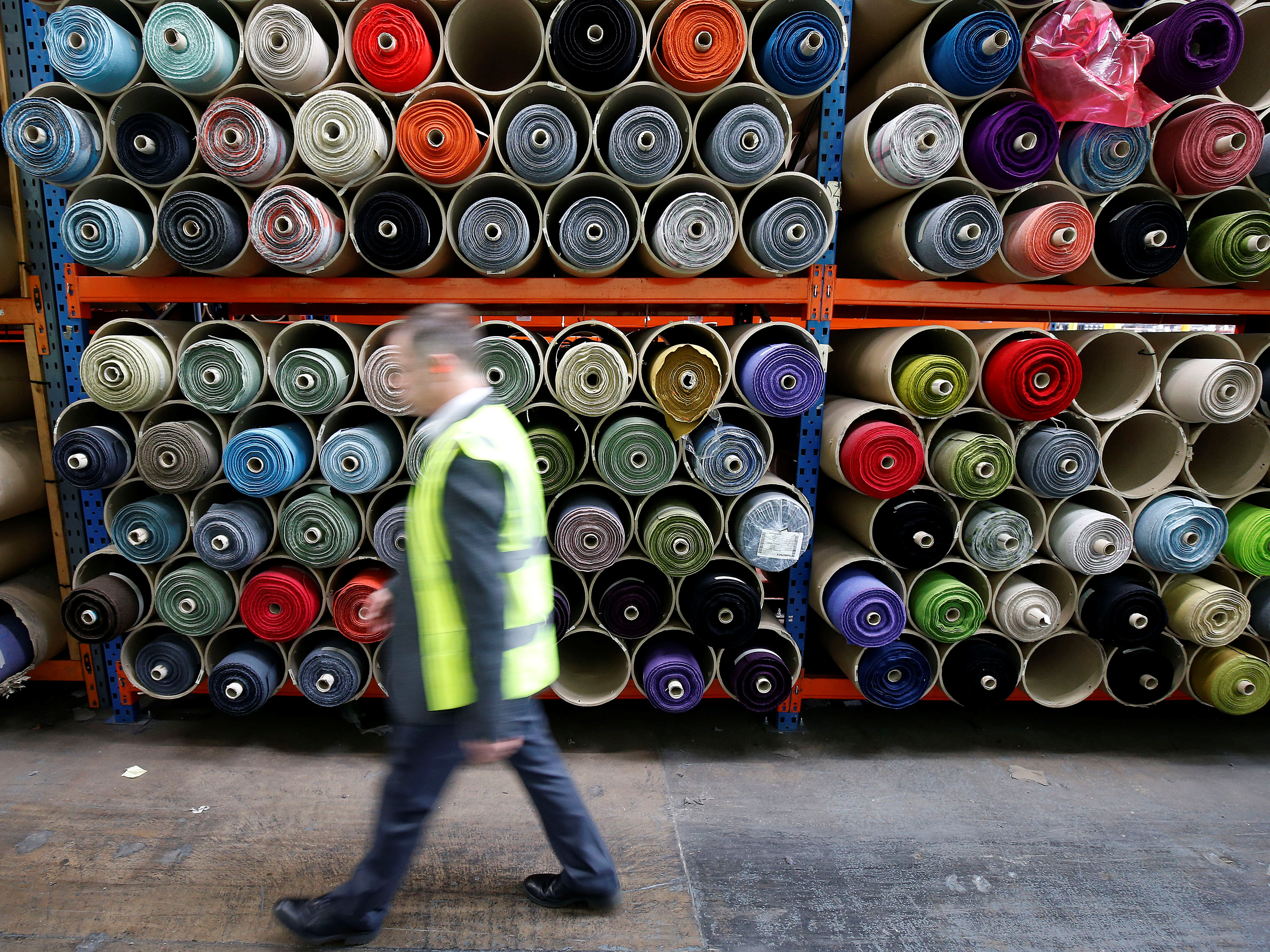 Rolls of fabric ready for export are stacked at Camira Fabrics in Huddersfield