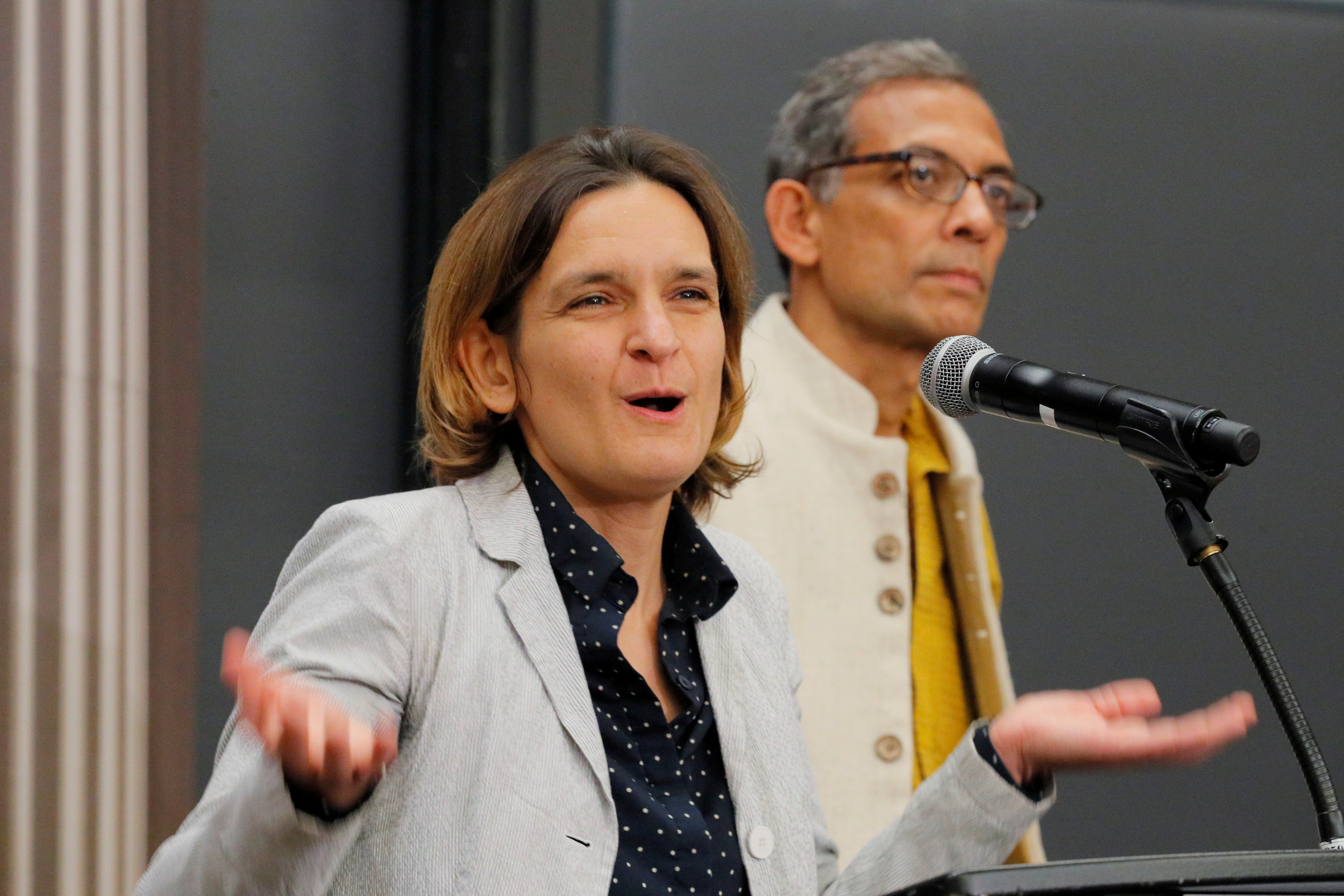 Abhijit Banerjee and Esther Duflo, two of the three winners of the 2019 Nobel Prize in Economics, speak at news conference at the Massachusetts Institute of Technology (MIT) in Cambridge, Massachusetts, U.S., October 14, 2019.     REUTERS/Brian Snyder/File Photo