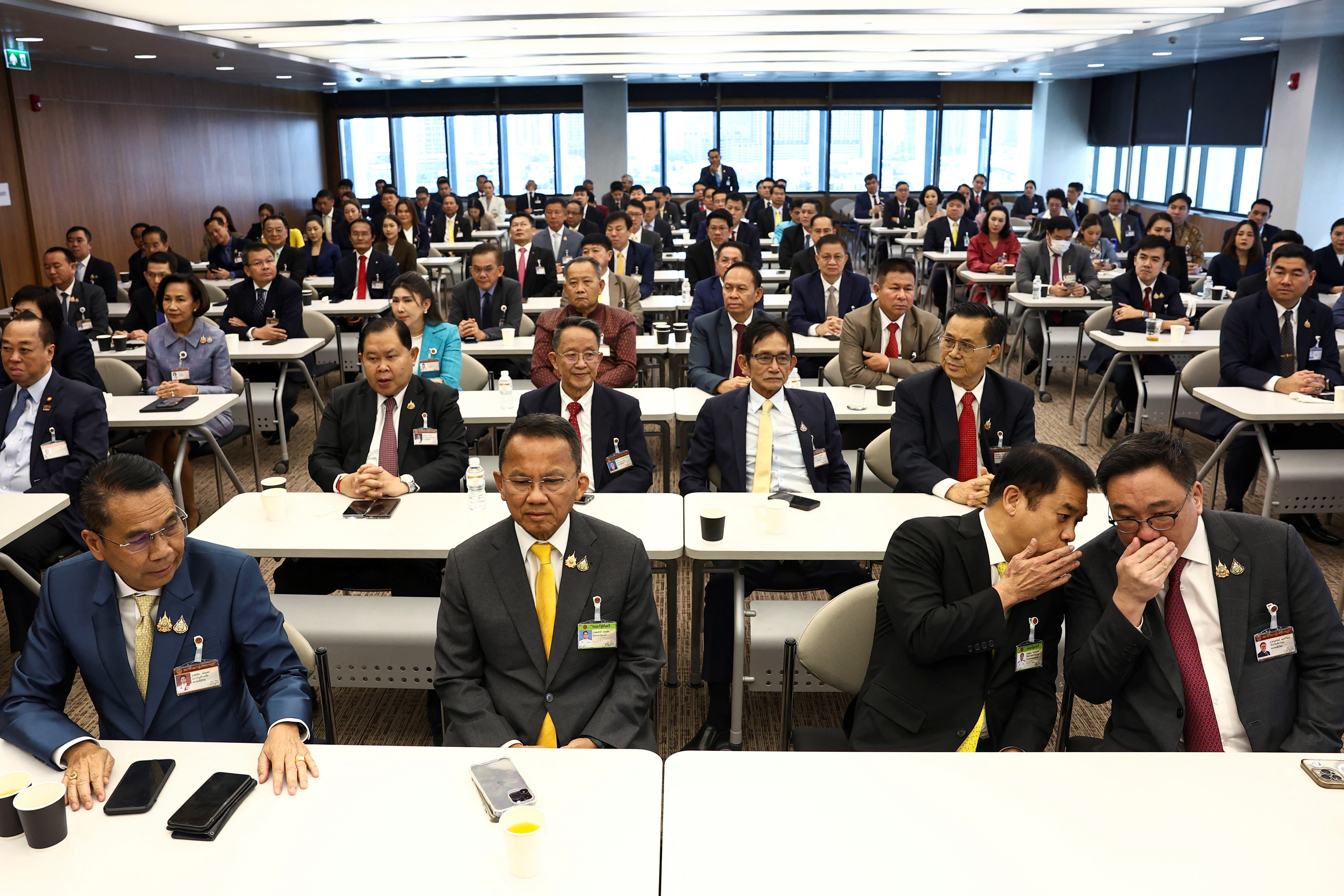 Pheu Thai Party members attend a meeting at the parliament house to select its PM candidate, ahead of a pivotal parliamentary vote on the new PM, in Bangkok