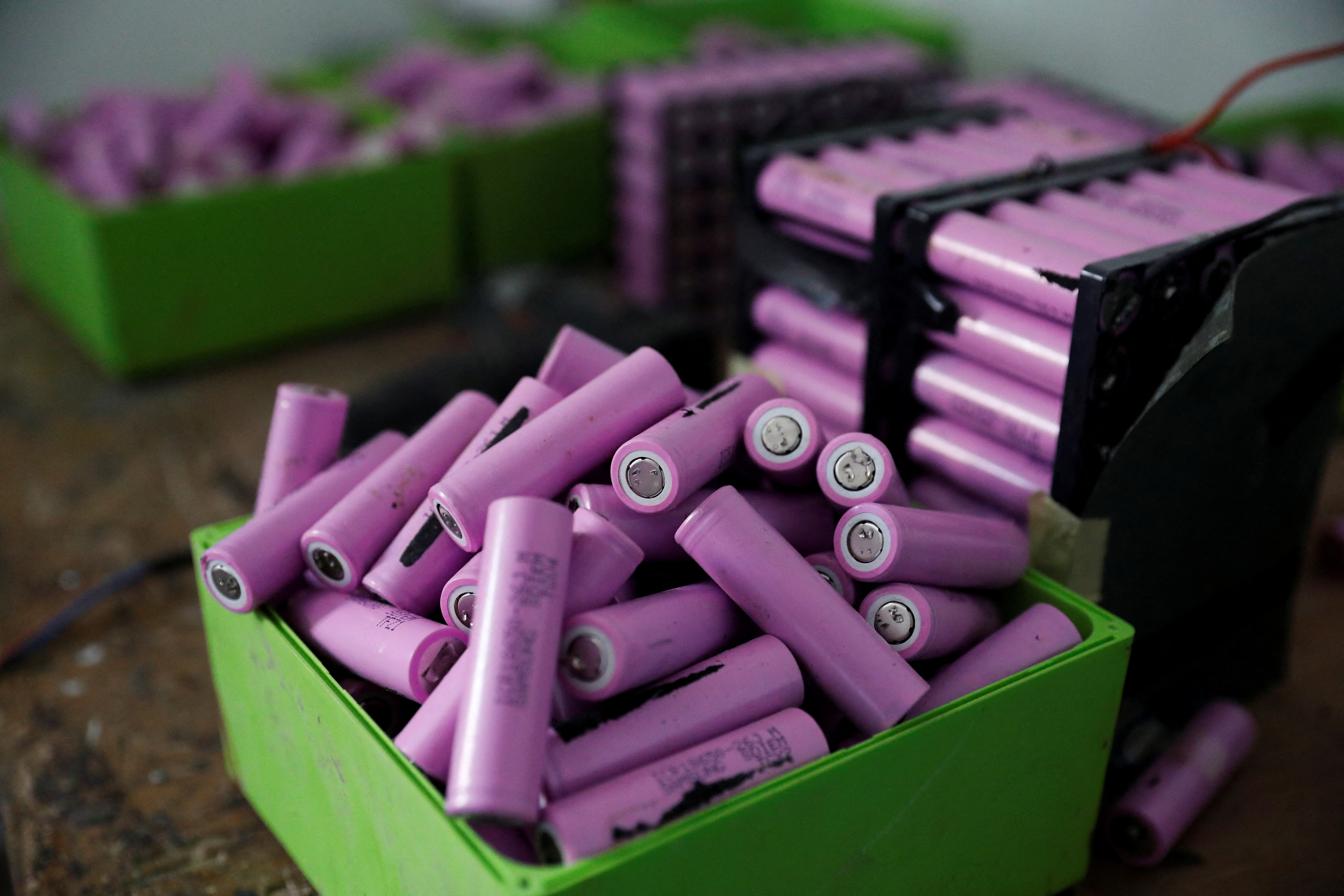 Lithium-ion cells from old laptop battery packs are pictured at the Quadloop recycling facility in Lagos
