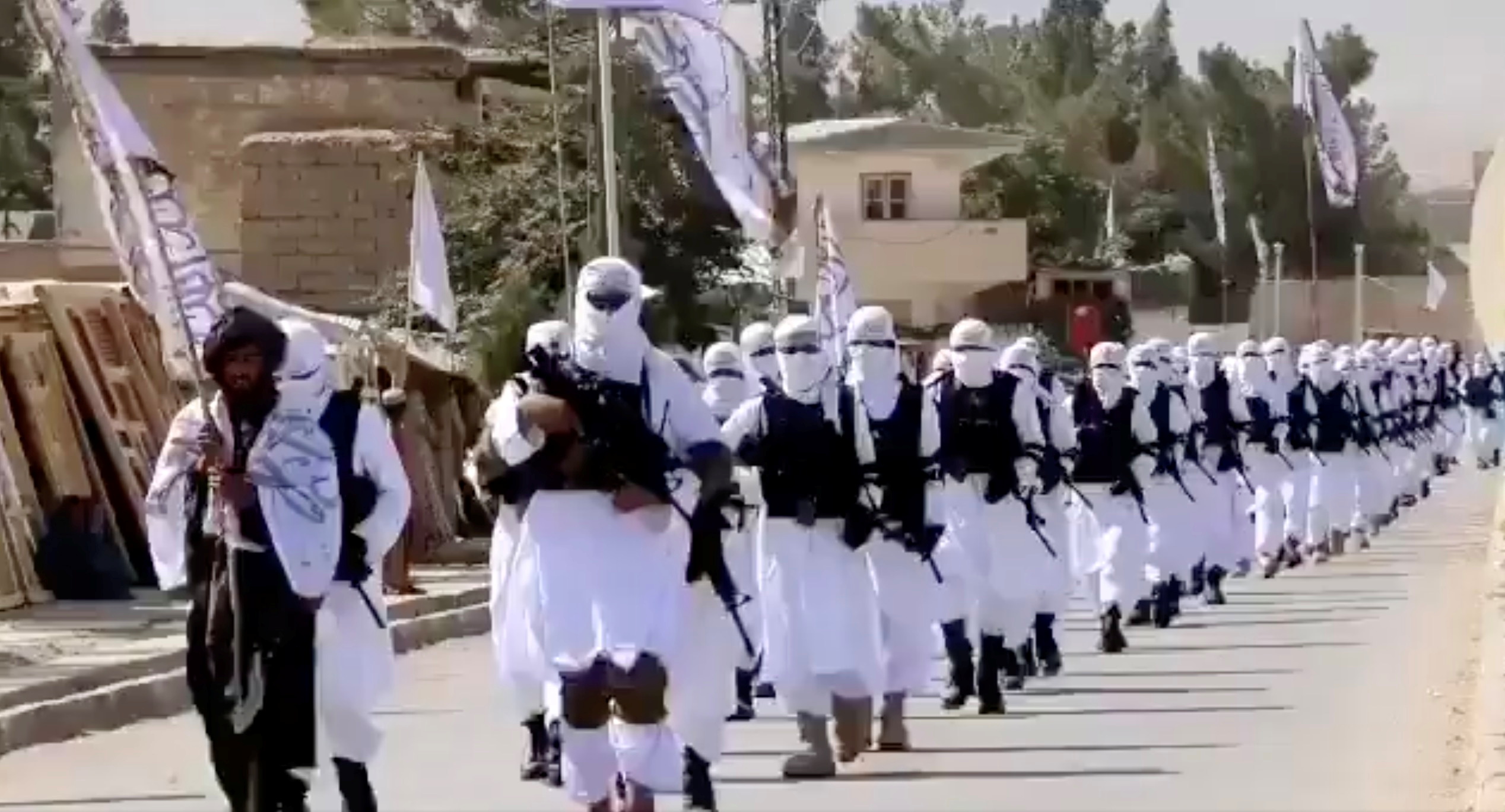 Uniformed Taliban forces parade in Qalat