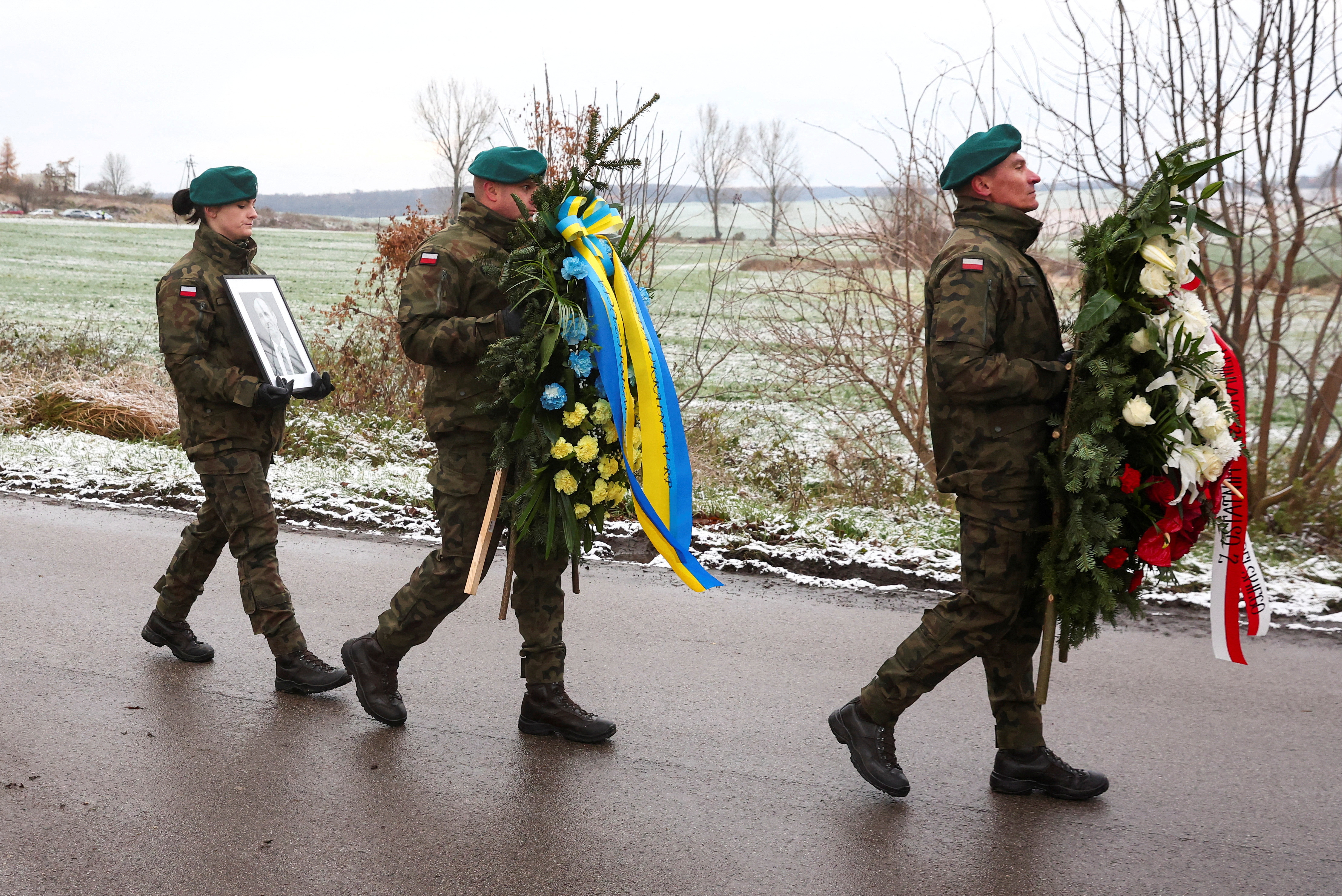 Polish village remembers missile victim's help for refugees | Reuters