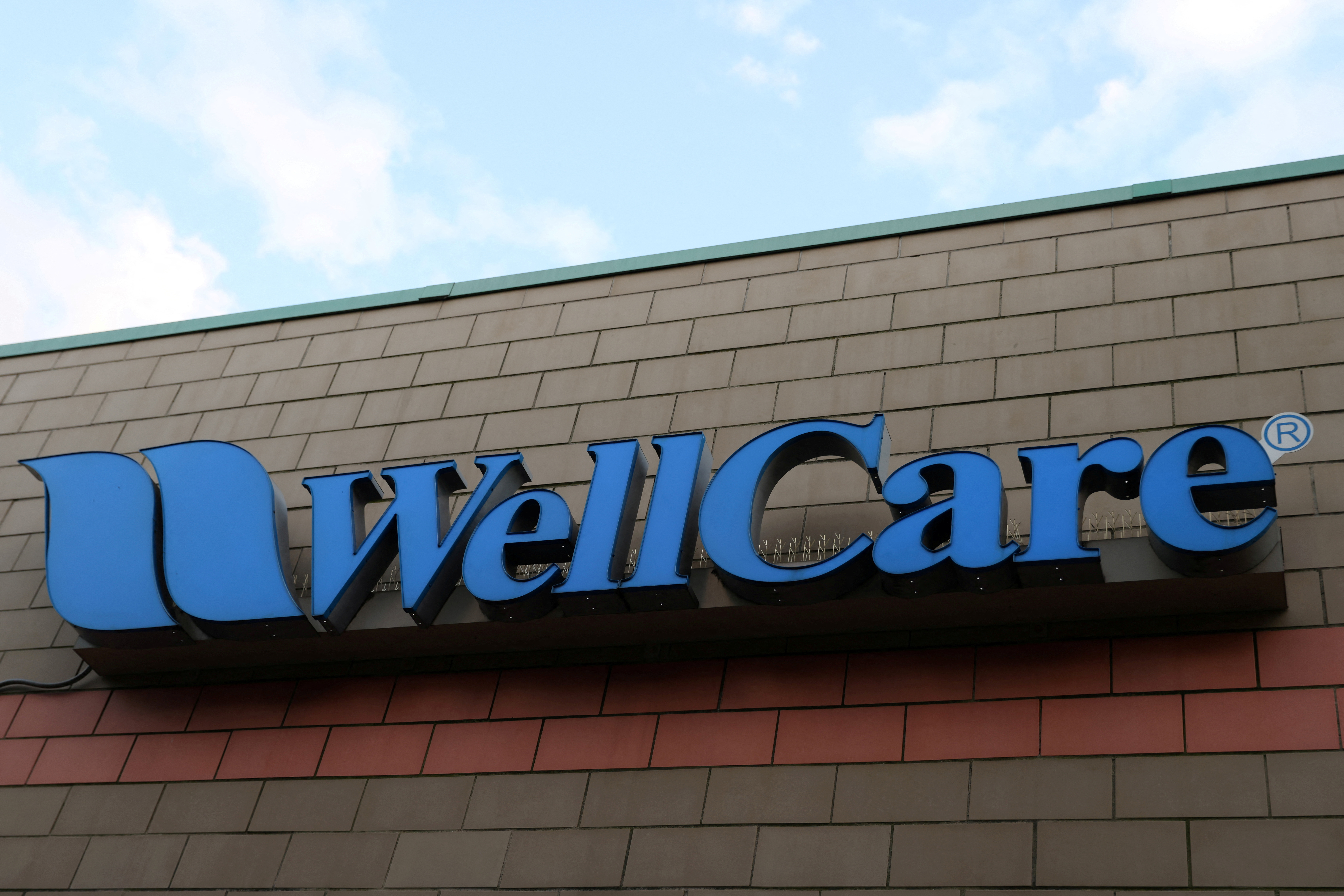 A sign for Wellcare, part of the Centene Corporation, is seen in Queens, New York