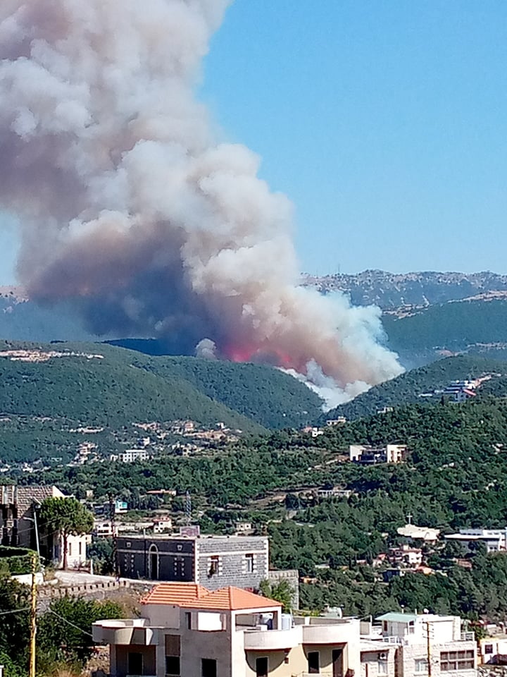 Smoke billows from a fire in Lebanese town of Qobayat