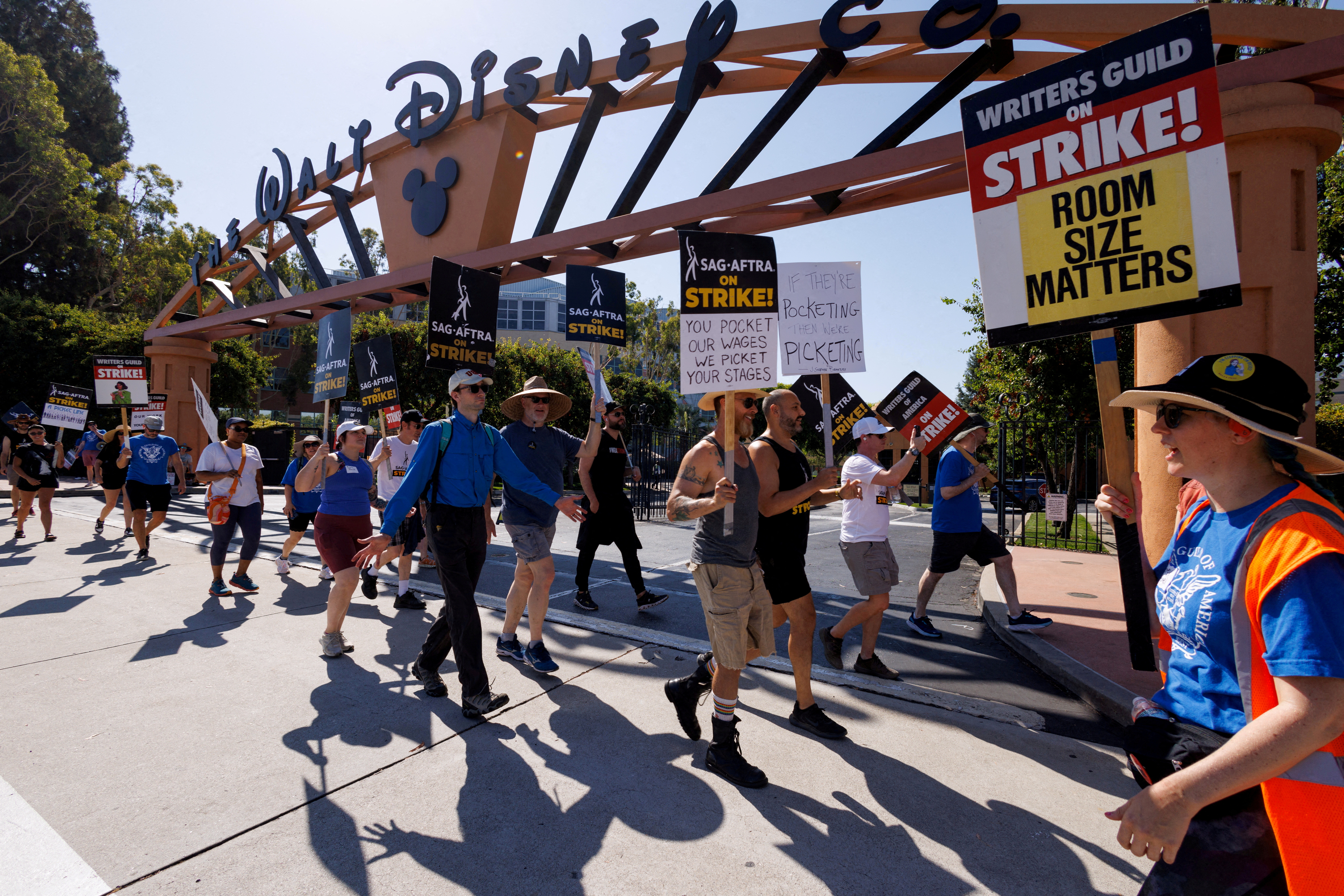 Hollywood actors and writers on strike outside Disney studios in California