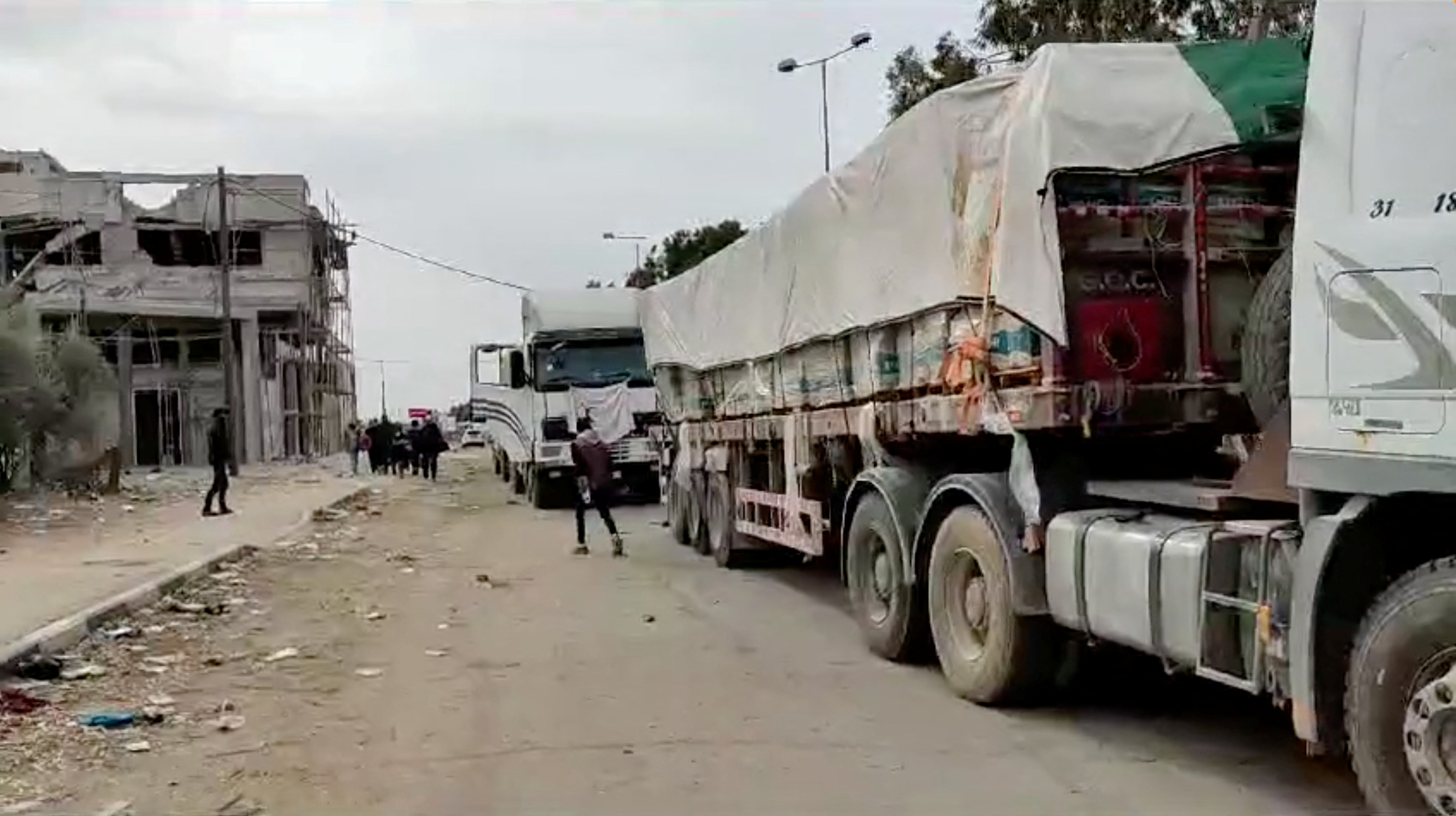 Palestine Red Crescent Society footage shows trucks with aid bound for north Gaza