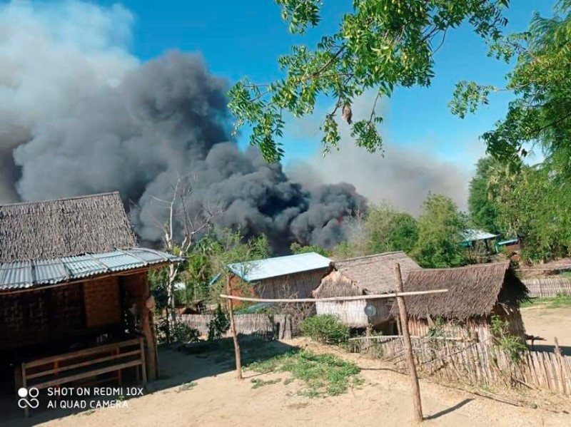 A view shows smoke from the fire in Kin Ma Village