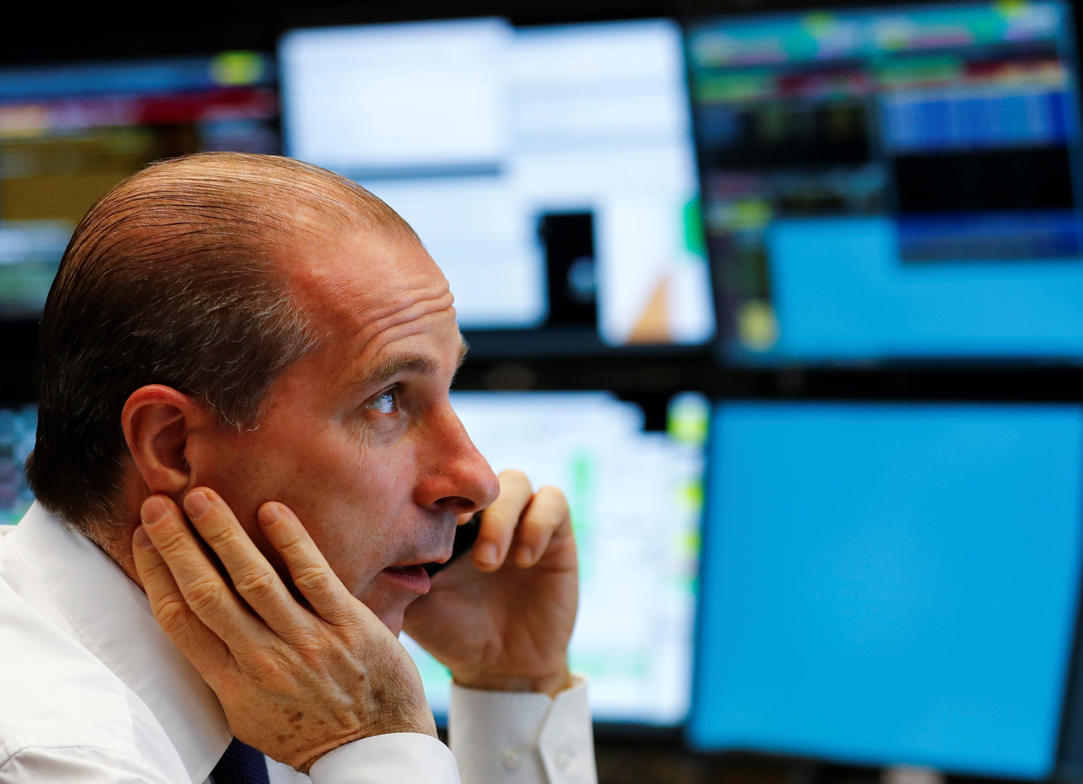 Stocks rise, dollar retreats ahead of Fed decision